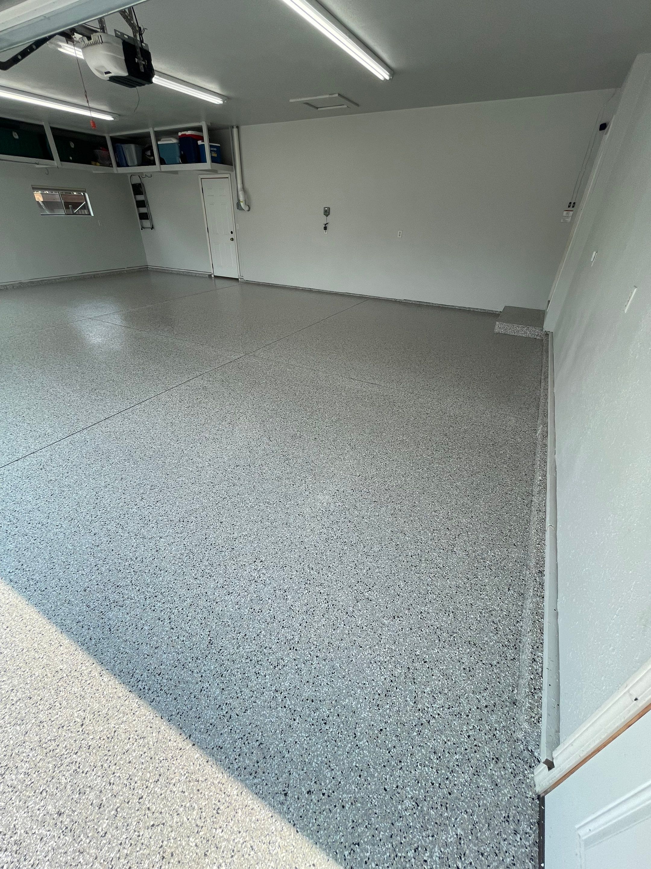 Multi-Car Garage Floor Coating and Crack Repair in Tea by Select Painting, Coatings & Garage Cabinets