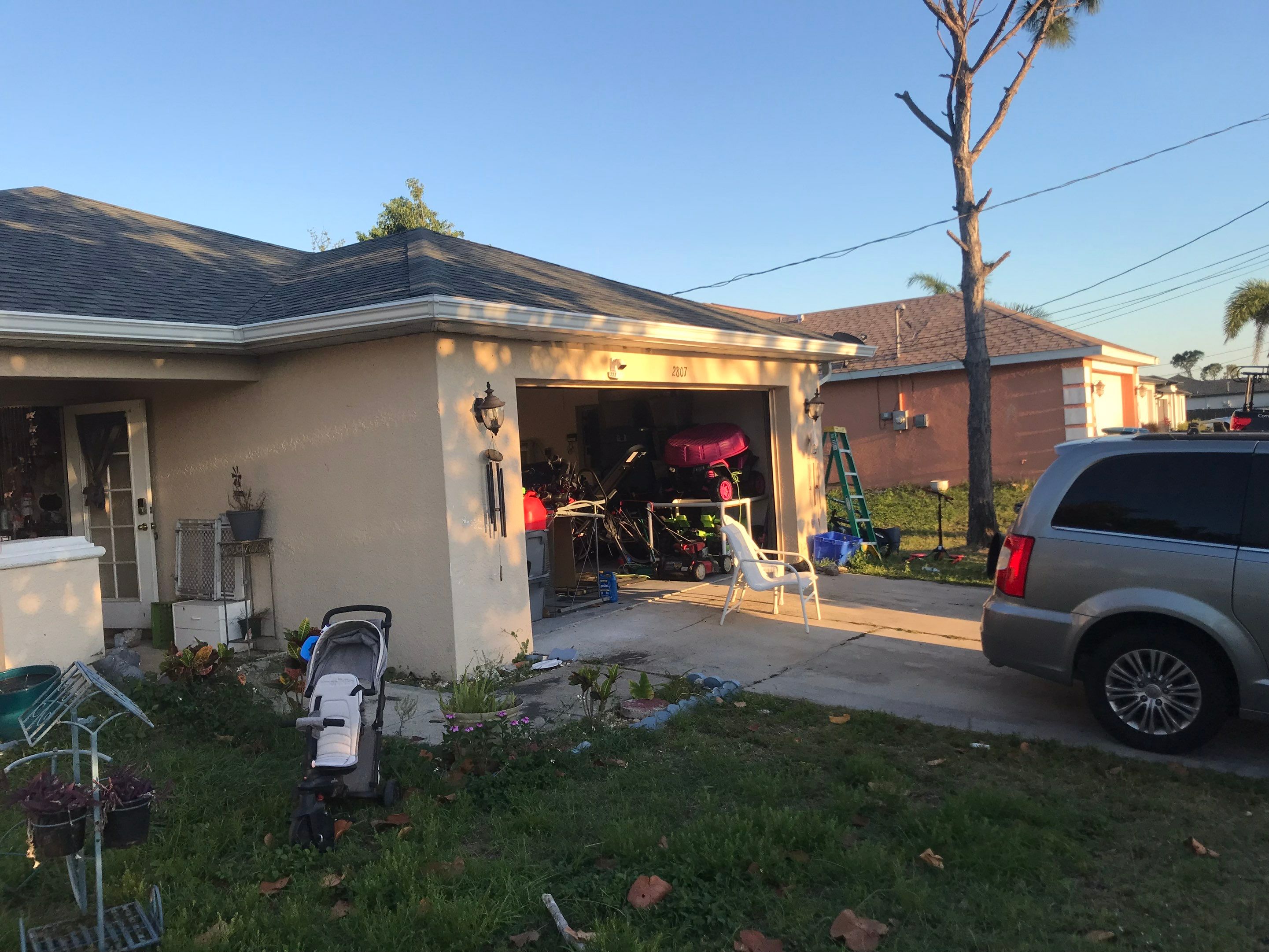 White Seamless Gutters and Soffit Installation in Cape Coral FL by Gutter Professors