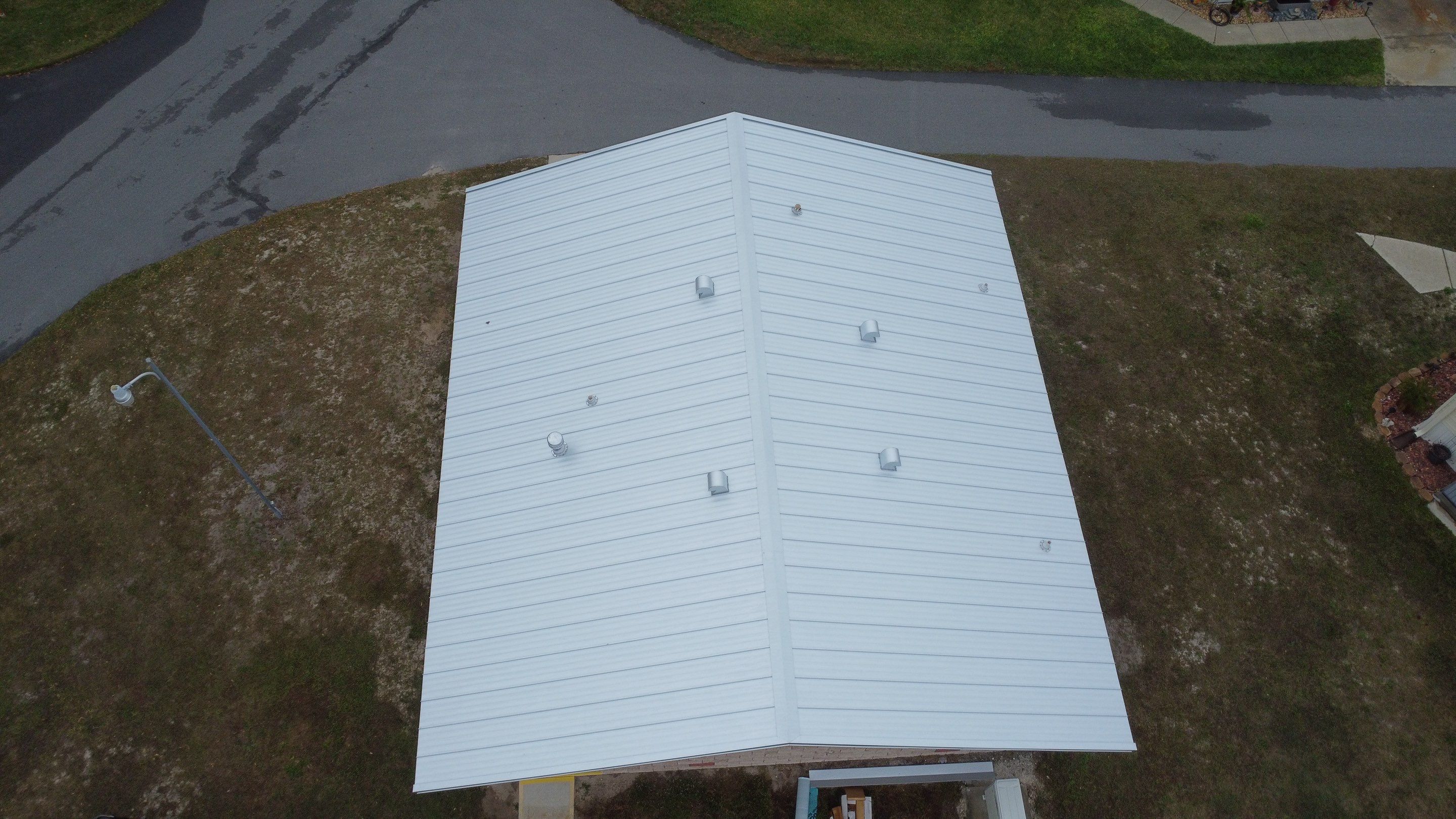 Bright White Standing Seam by Reimagine Roofing