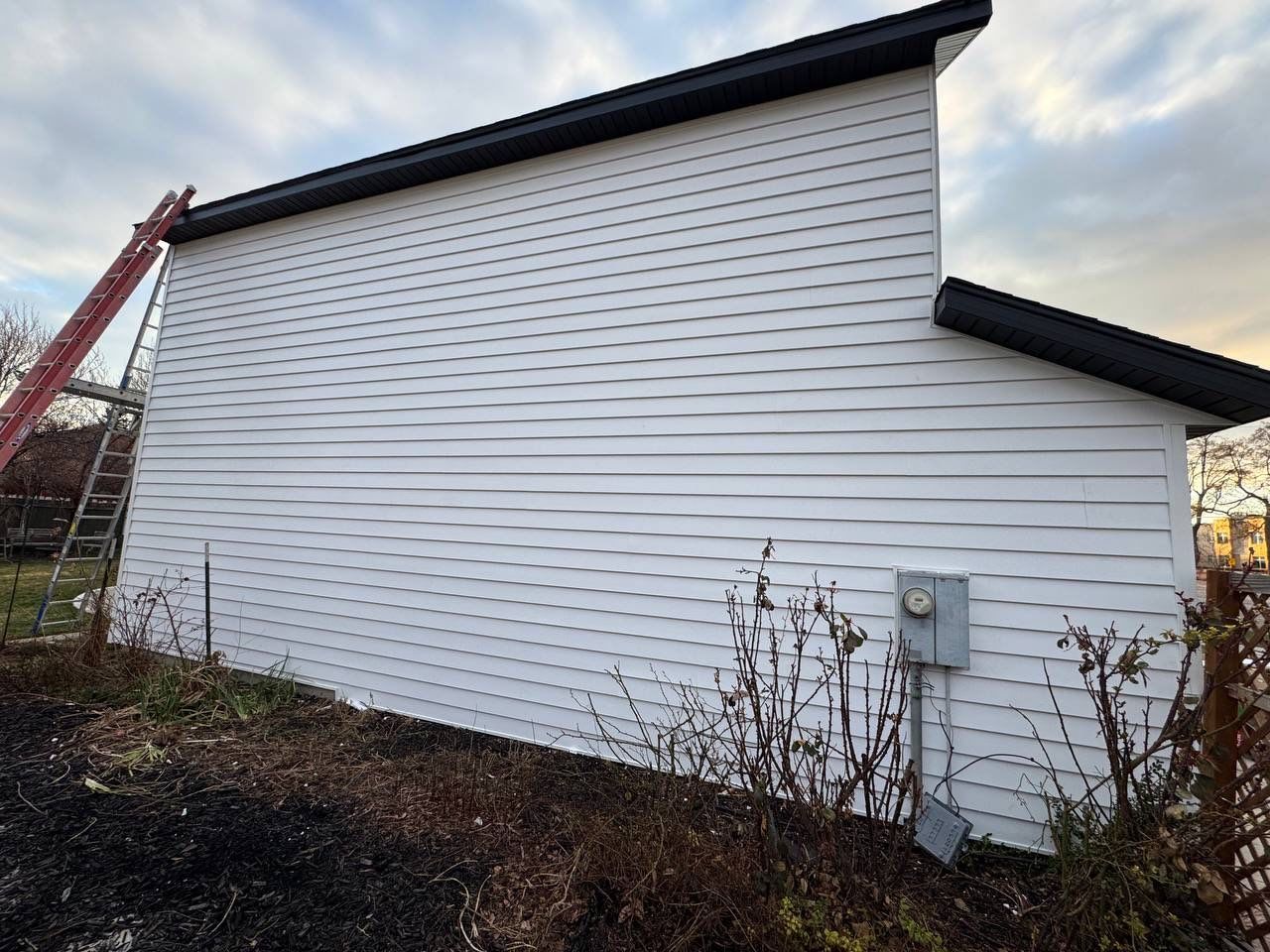 Salt Lake City | Premium Insulated Vinyl & Mixed Materials | Crisp White & Black by Ideal Siding Utah