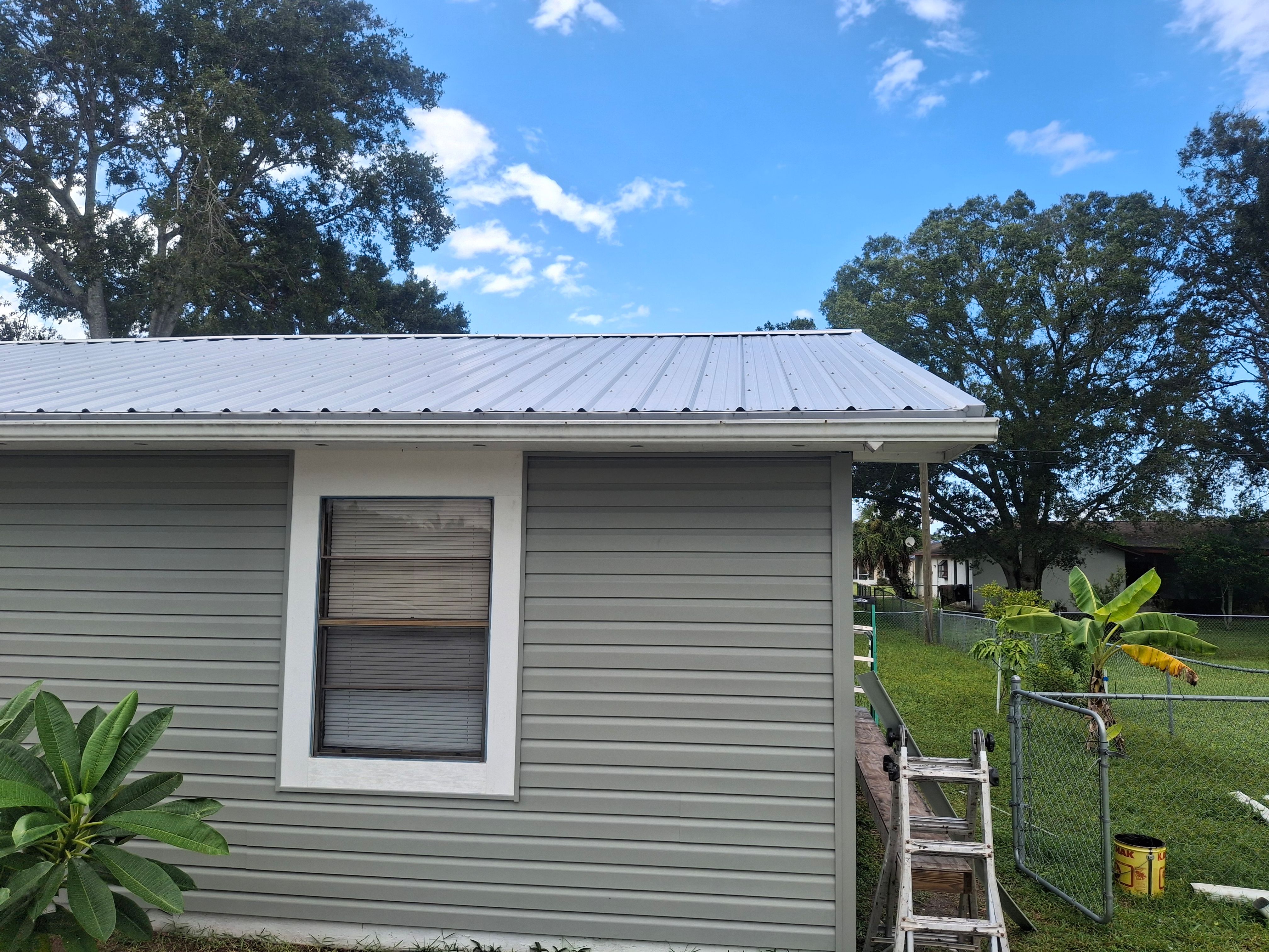 Vinyl Siding Installation and Structural Wood Rot Repair in Palm Bay by Florida Roofing and Renovations Inc.