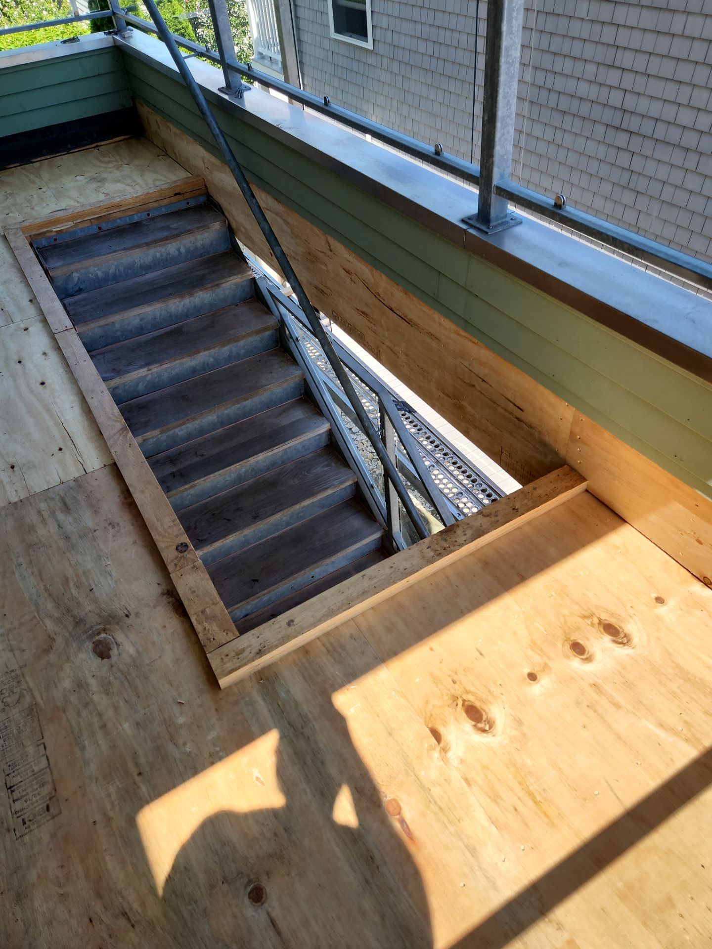 Deck Installation using Tanzite Stone Decking by A Plus Exterior