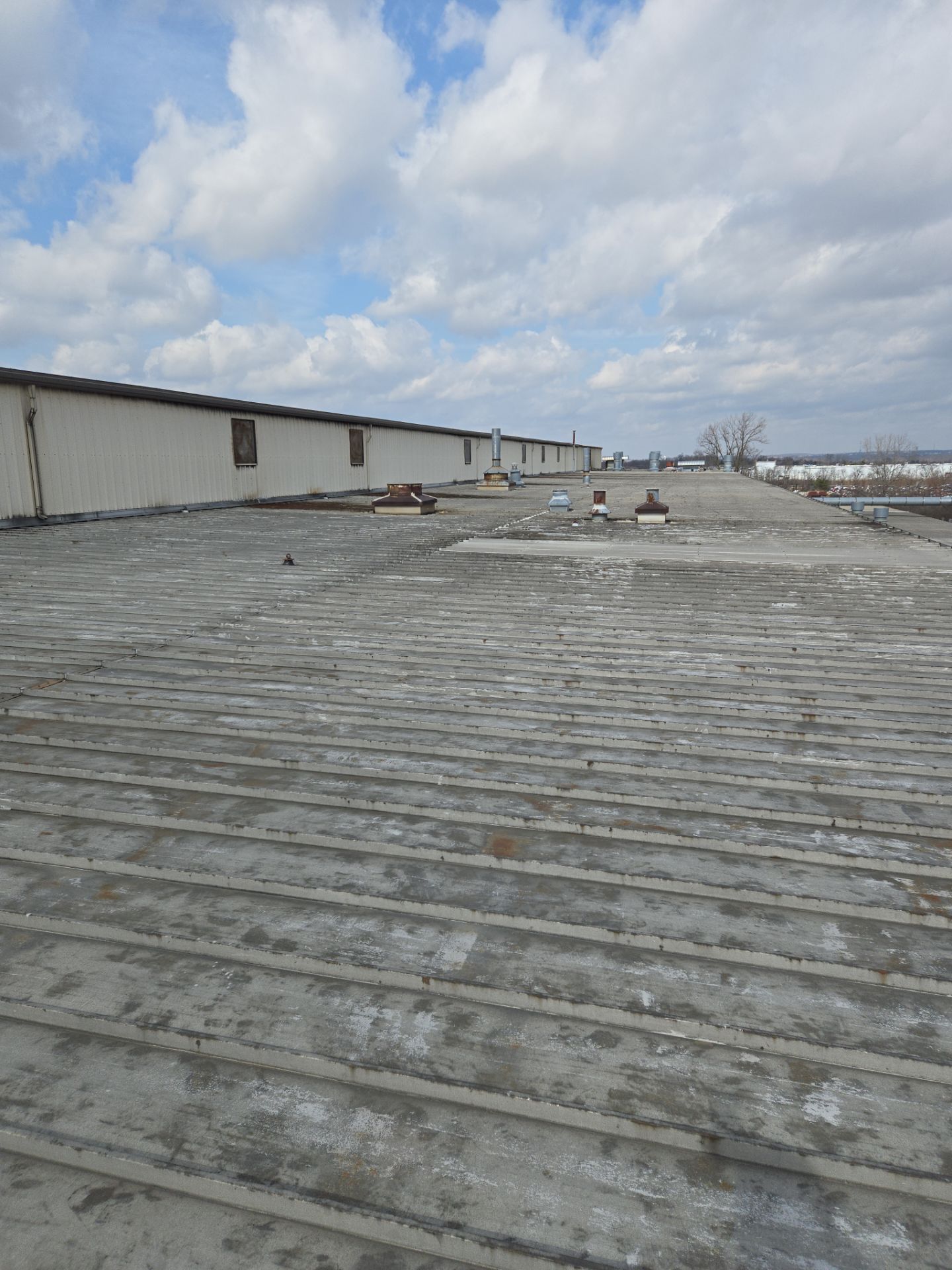 Commercial Metal and Flat Roof Repairs in Mason, Ohio by Level Up Roofing and Restoration Services LLC