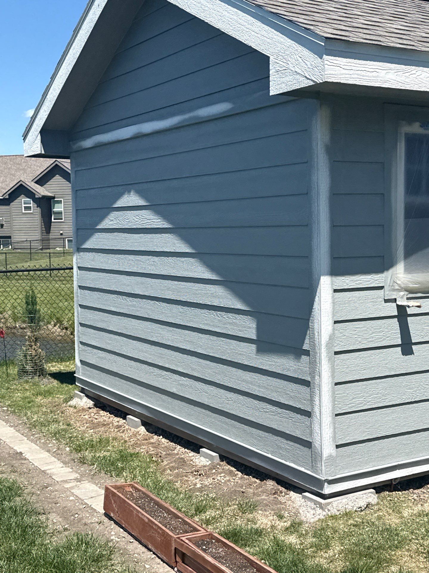 Residential Exterior Repaint in Ankeny by Midwest Paint LLC