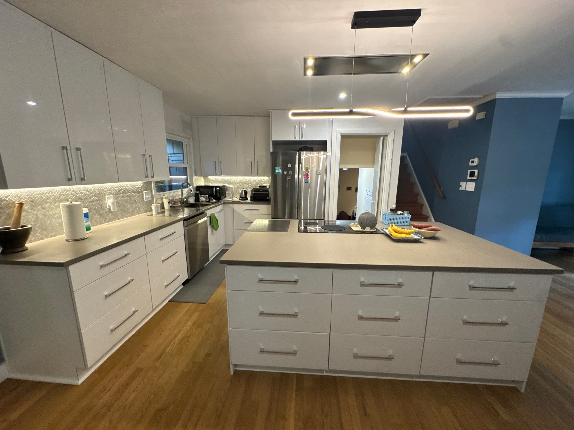 Modern Kitchen Remodeling with Large Central Island in Doraville by Swift Home Renovations