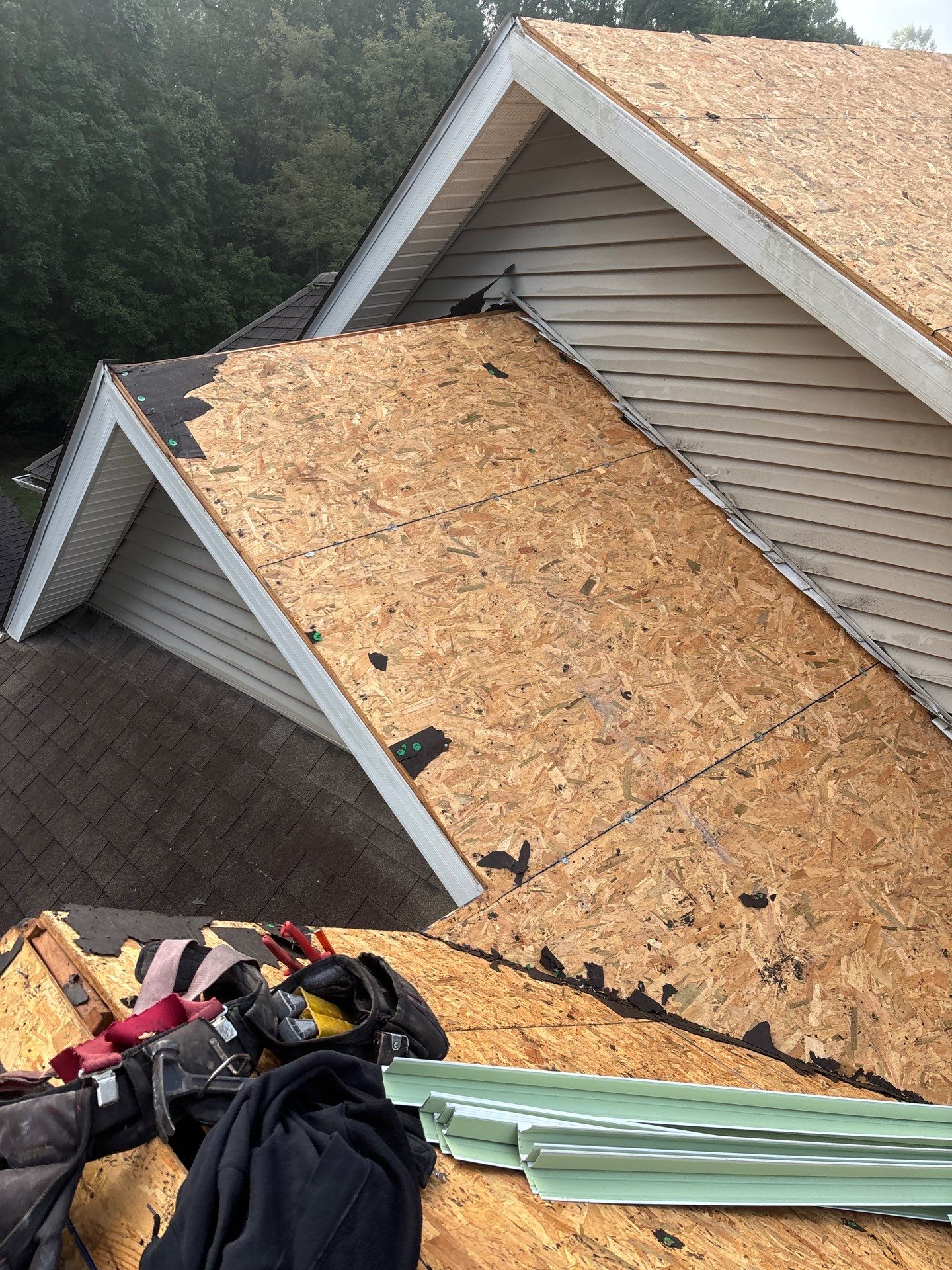 Residential Roofing Installation using GAF Timberline HDZ Weatherer Wood by Rainstoppers Roofing