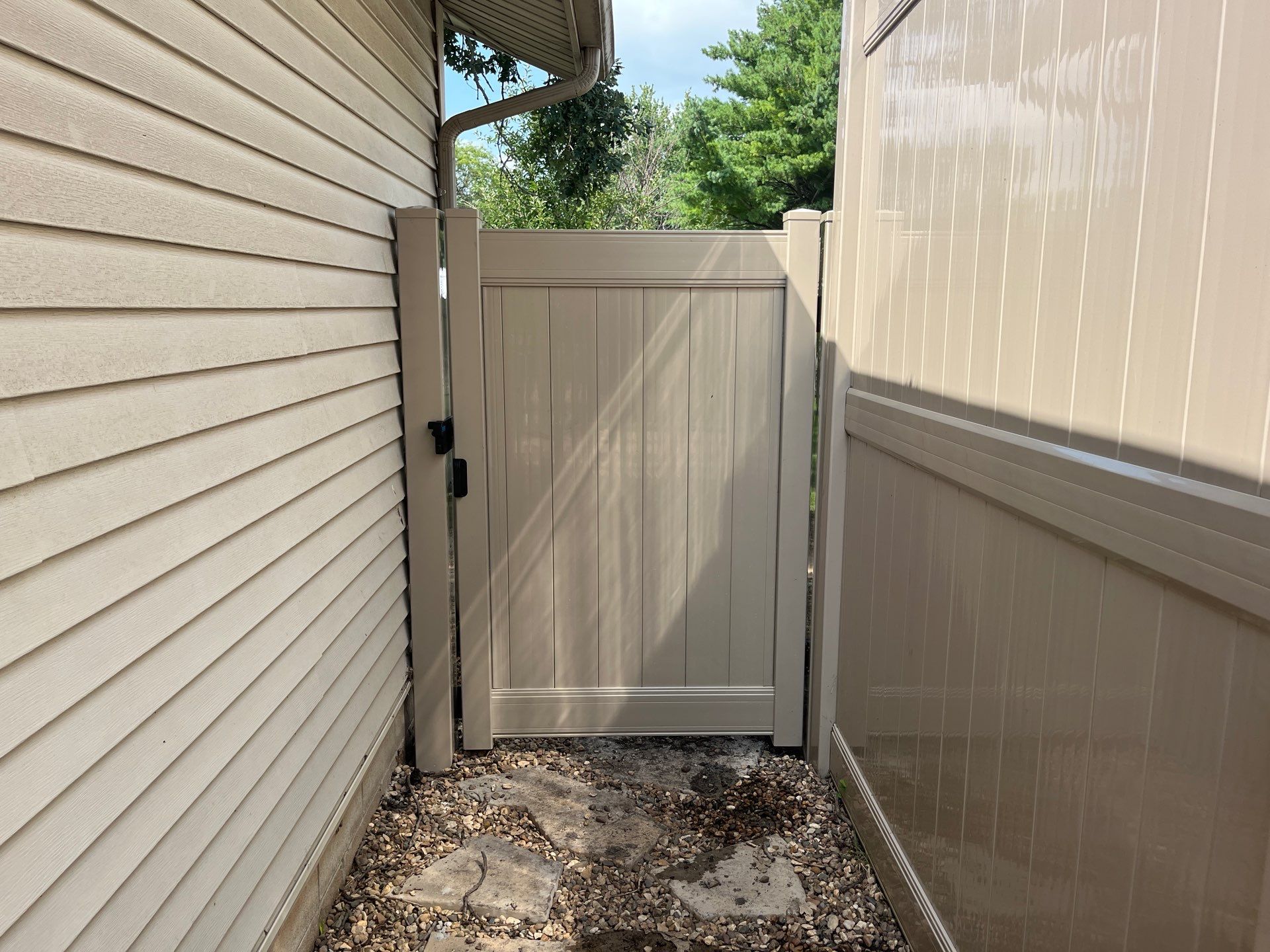 Adobe Vinyl Privacy Fence and Gate Installation in Waterloo by Perfect Picket Fence and Stain