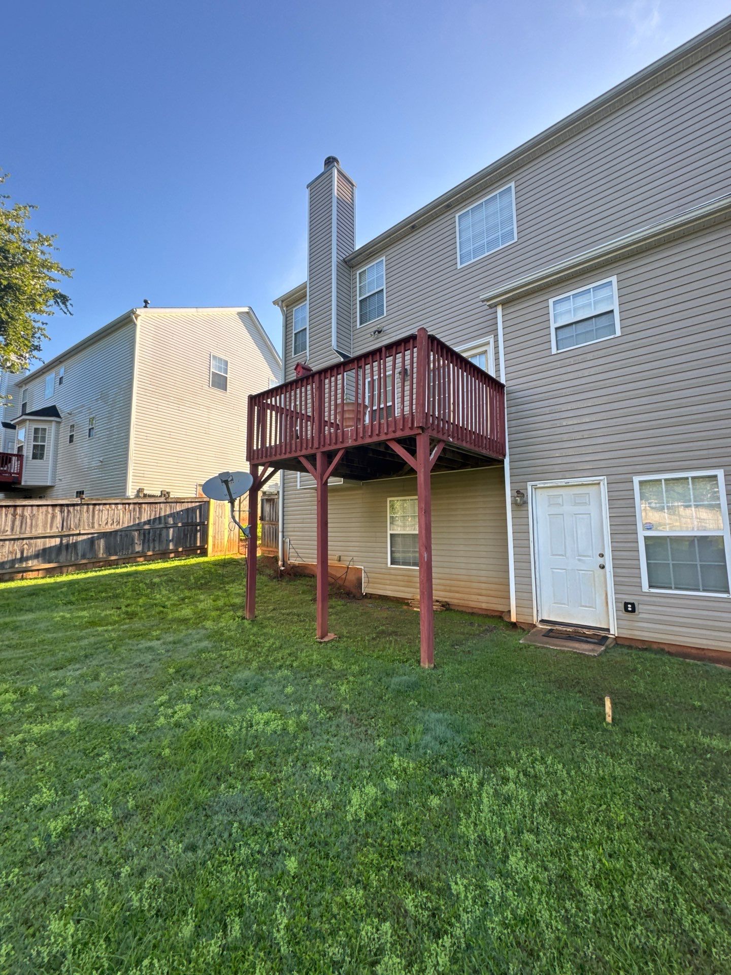 Backyard Deck Expansion & Custom Staircase Installation in Suwanee. by Swift Home Renovations