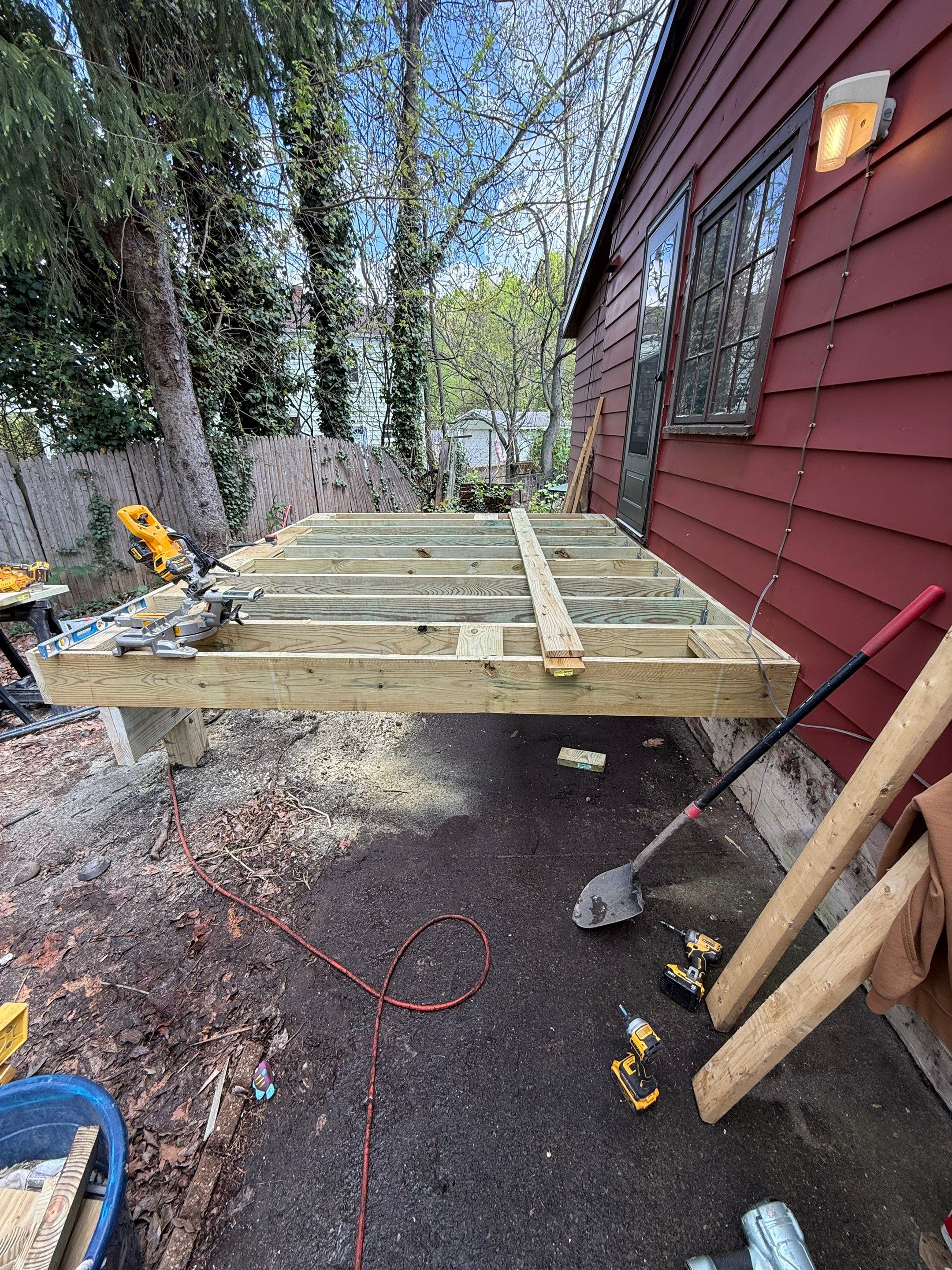 Roof sunspace deck  by Cousins Roofing Siding & Decks