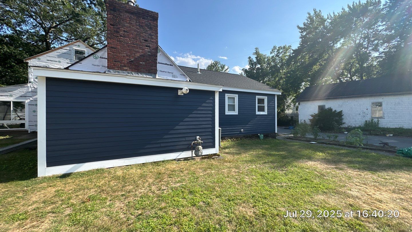 James Hardie Lap Siding Installation in Chelmsford, MA by Mighty Dog Roofing of Greater Middlesex County