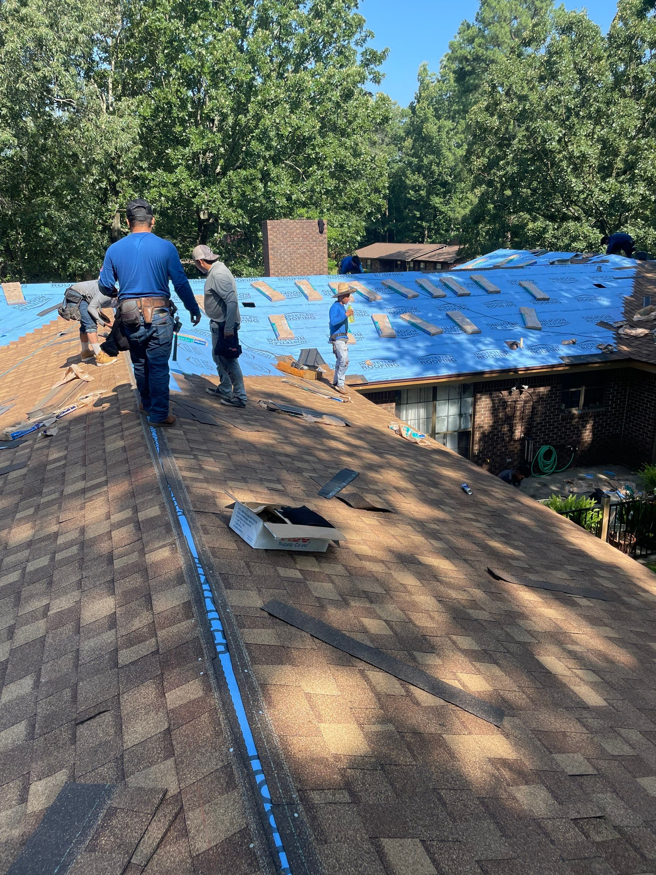 Storm Restoration Reroof: 25 Year 3-Tab Shingle by Hostetler Roofing