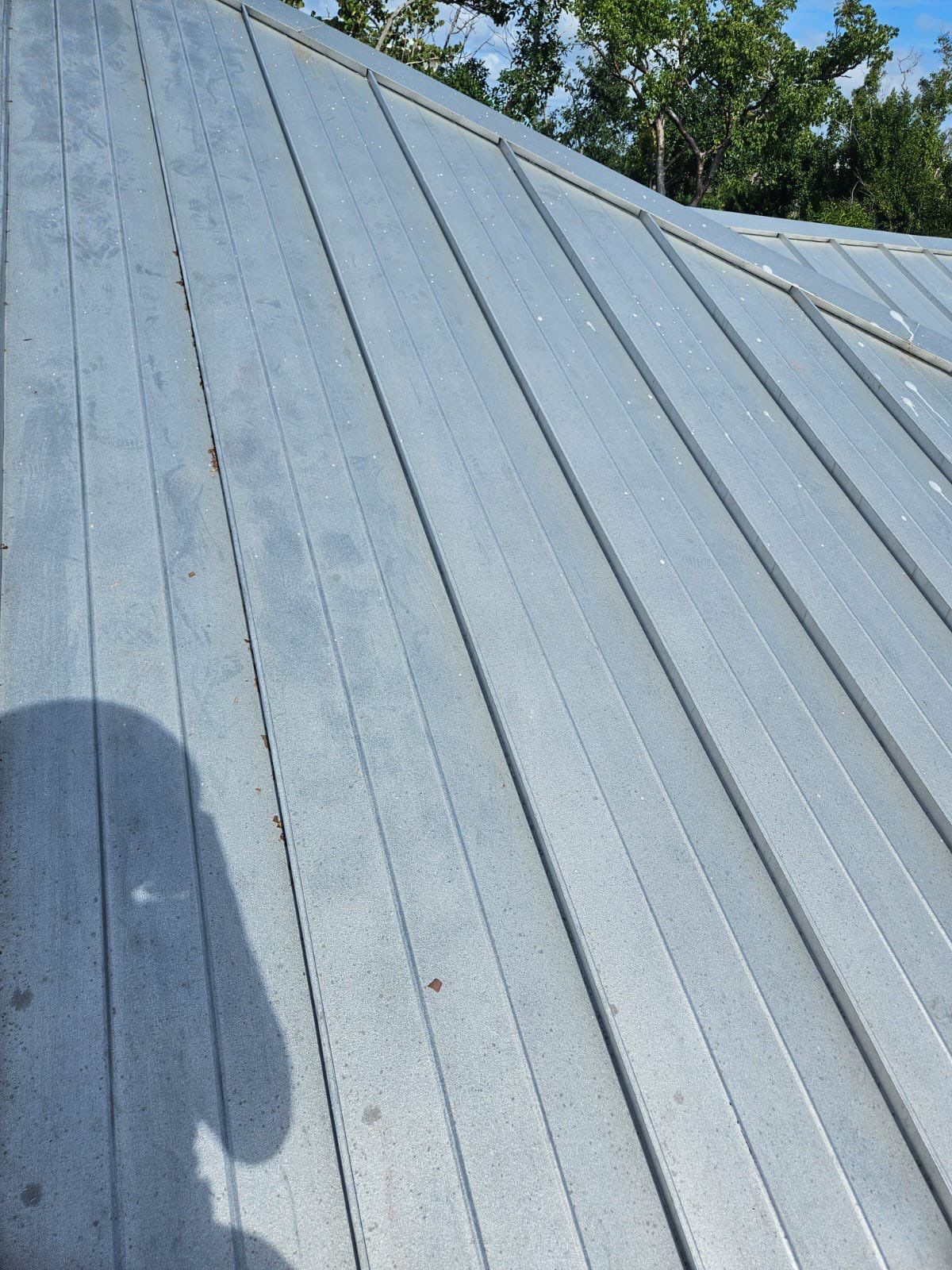 Residential Roofing Repair using Gulf Coast Metals Gulf Seam Panels by Four Peaks Roofing