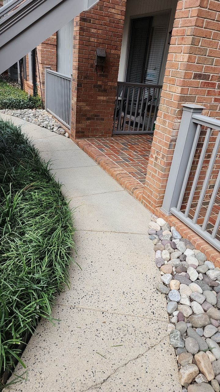 building clean using cleaner by Power Wash Masters LLC