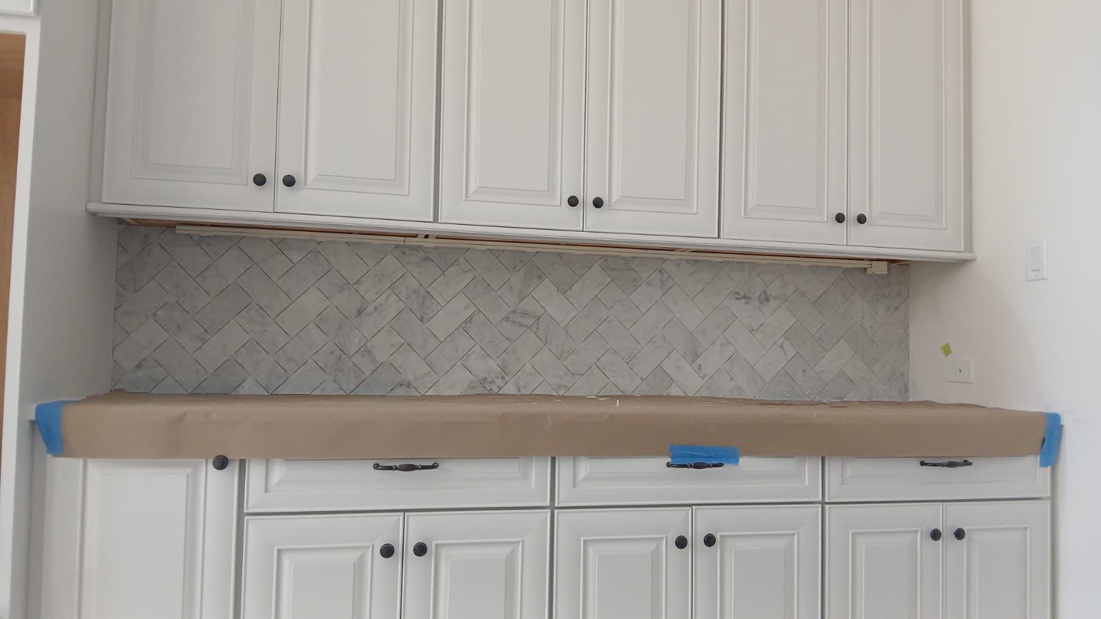 Kitchen and Bathroom Remodel Featuring Custom Stone and Tile in Mico by Mena stone surfaces