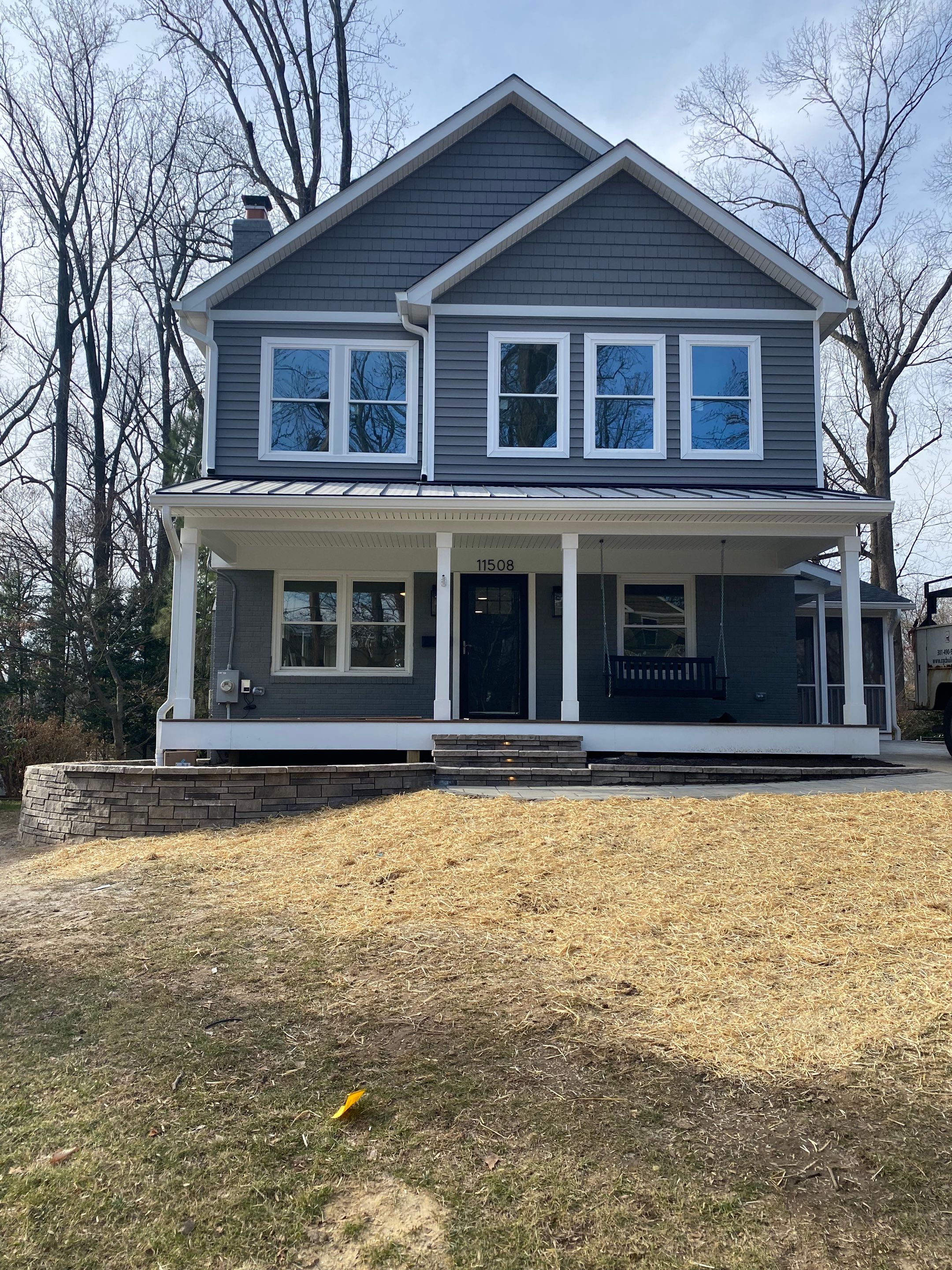 Retaining wall, walkway, small patio and landscape install by The Smet Companies, LLC