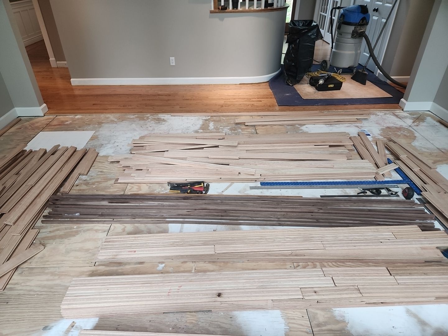 Ann Arbor Elegance: Red Oak and Walnut Living Room Masterpiece by Ann Arbor Hardwoods