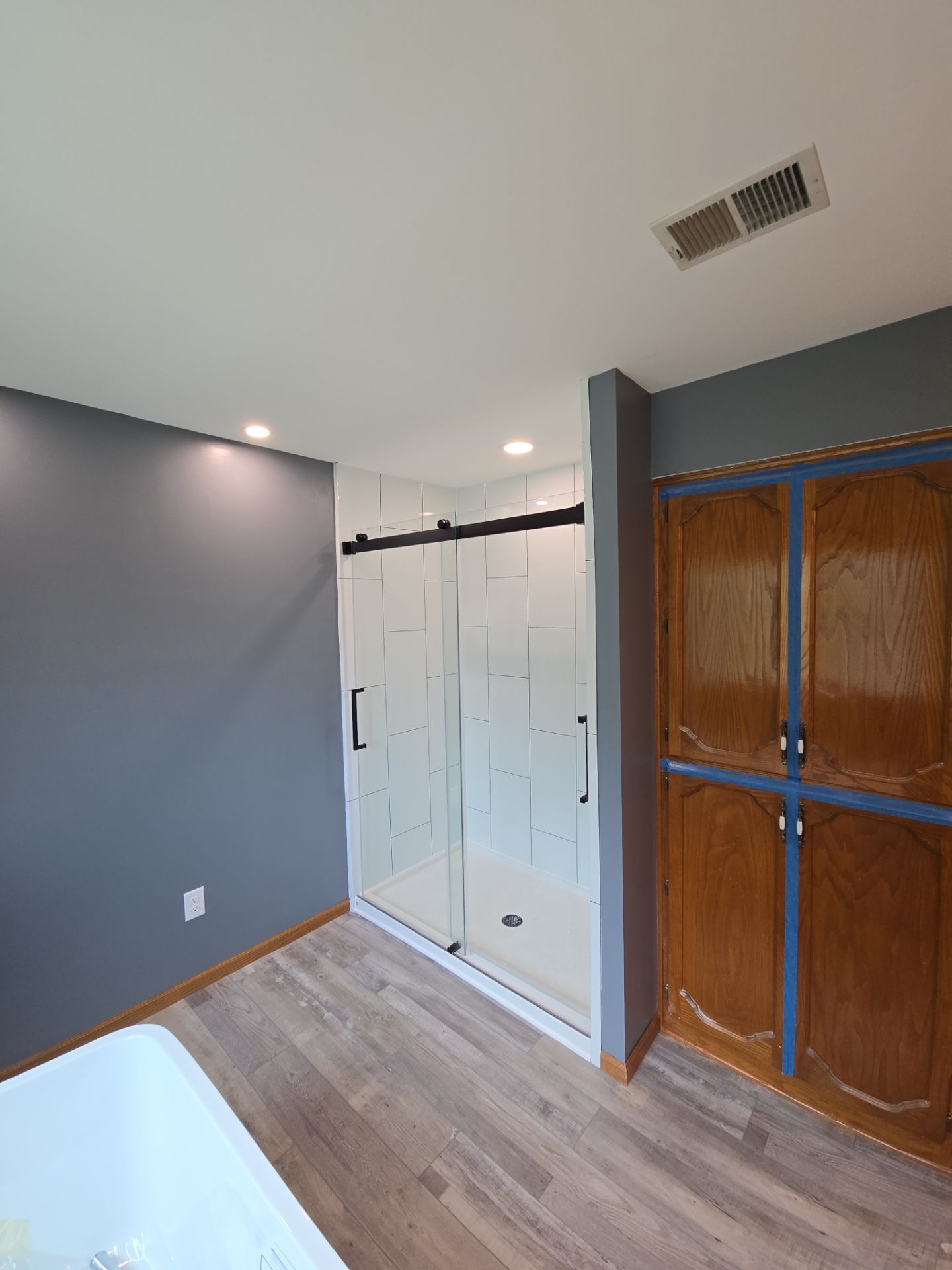 Full bathroom remodel, all new except vanities by The Shower Company