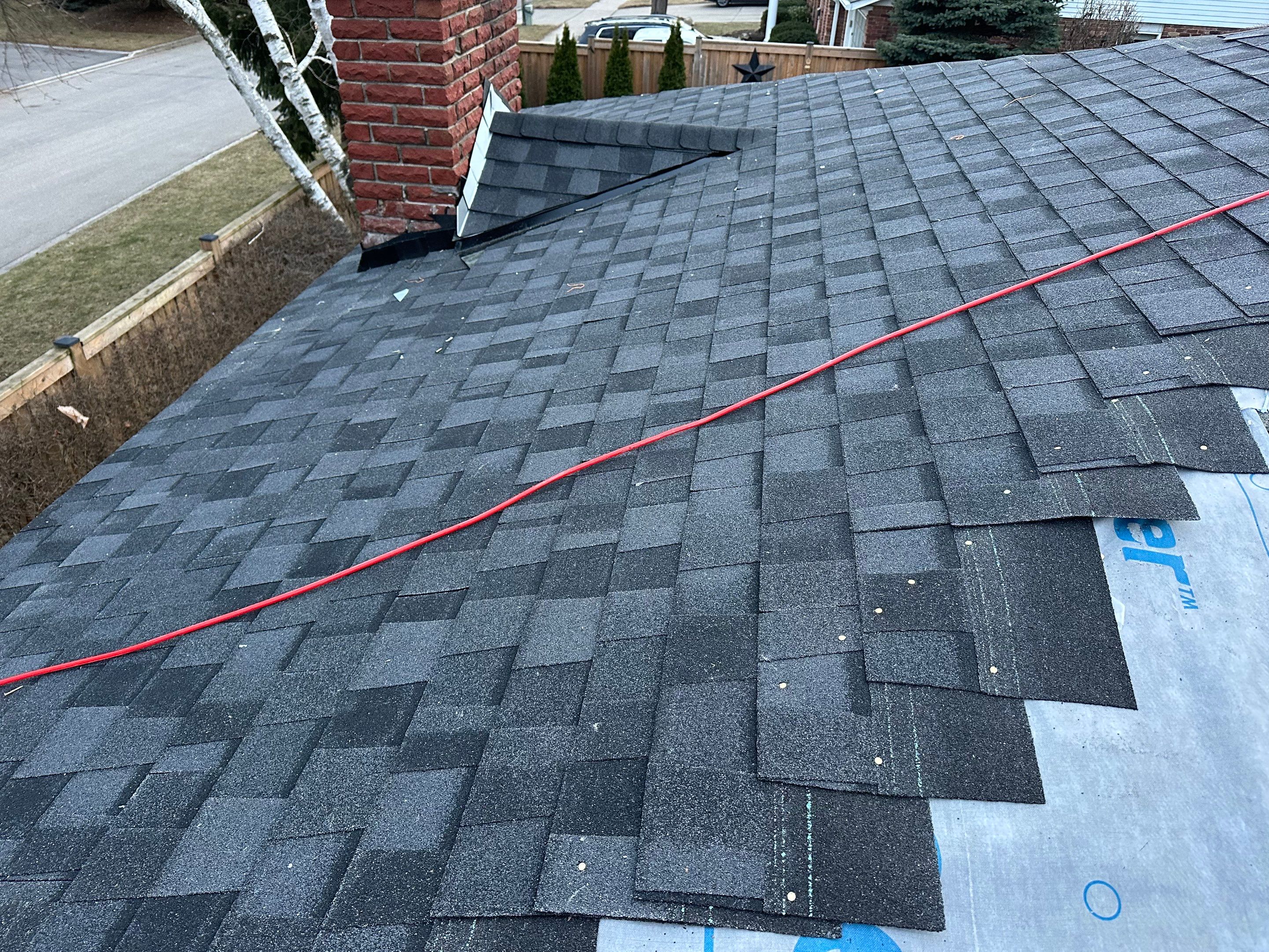 Project in Burlington by The Roofing Crew