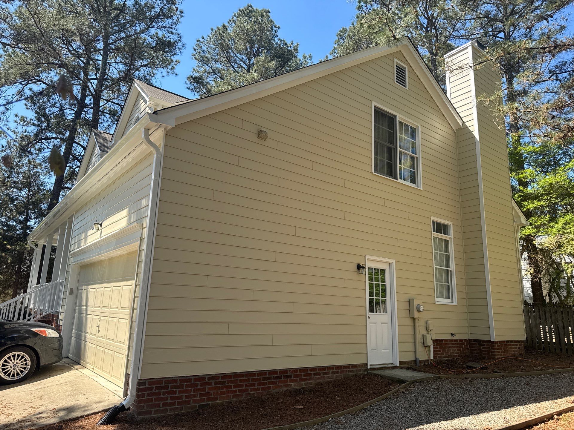Exterior paint and siding replacement by GonzalezPainters & Contractors Inc 