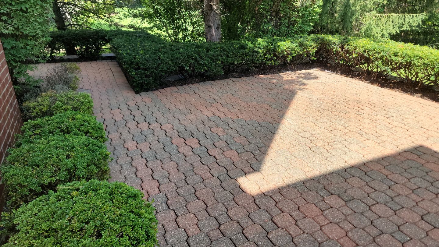 Brick paver repair, clean and seal by Northern Power Washing LLC.
