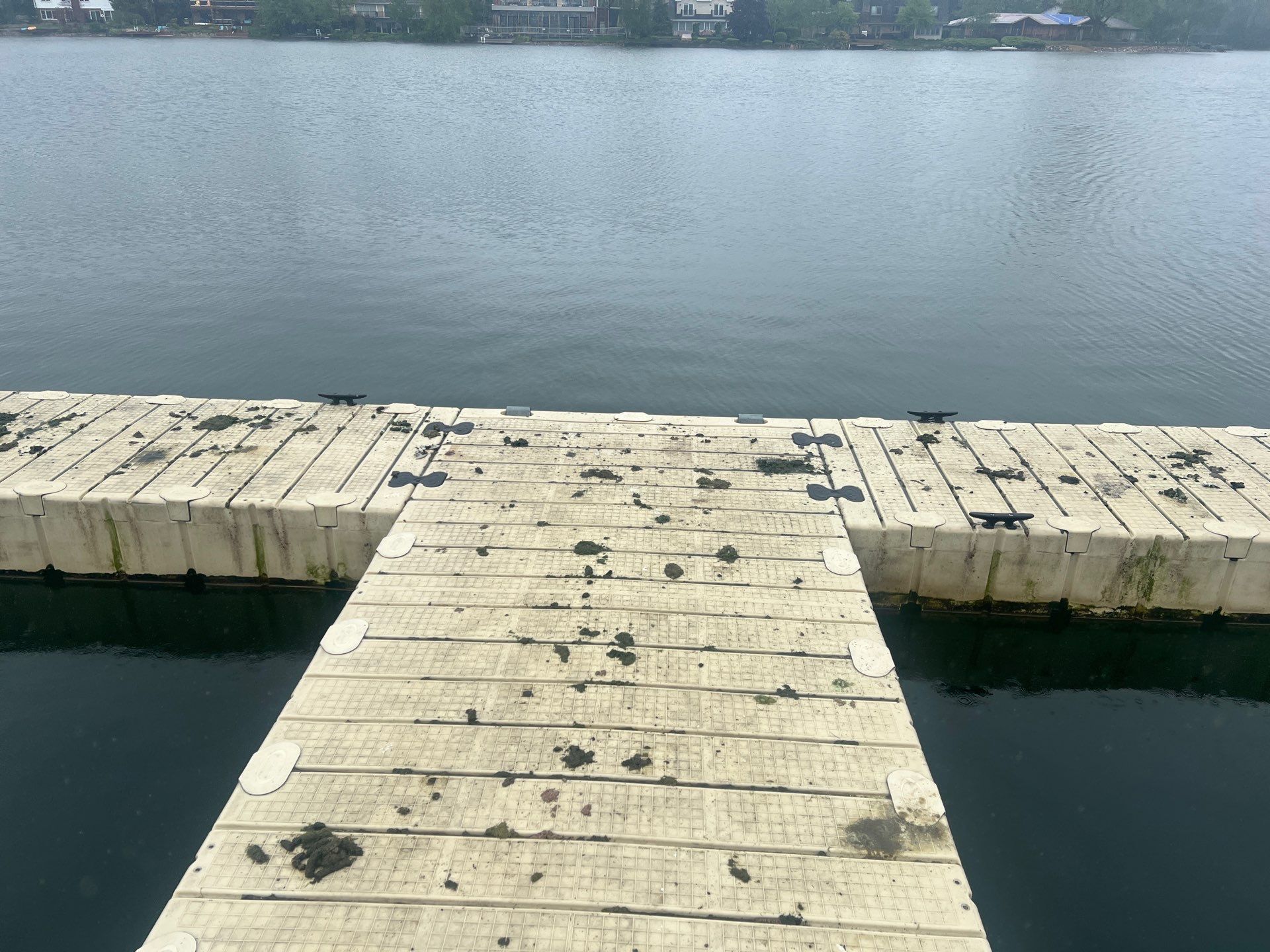 Power washing of floating dock by Northern Power Washing LLC.