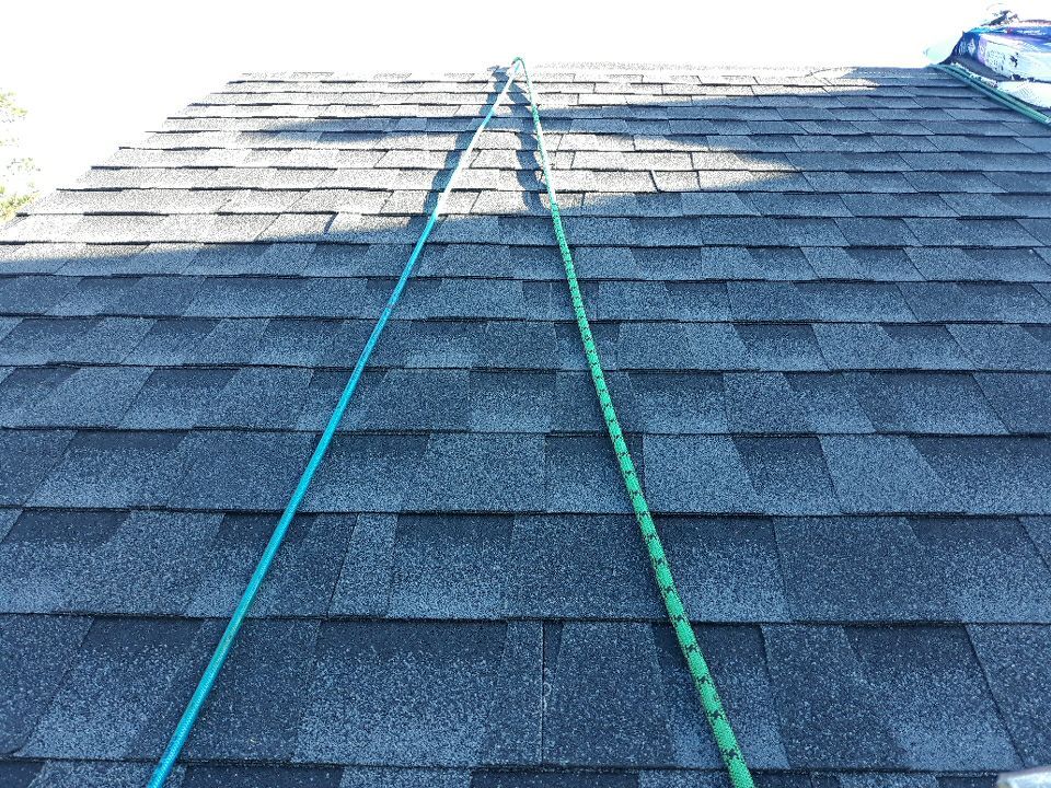 Residential Roofing Installation using Roof Replacement by American Roofing & Construction LLC