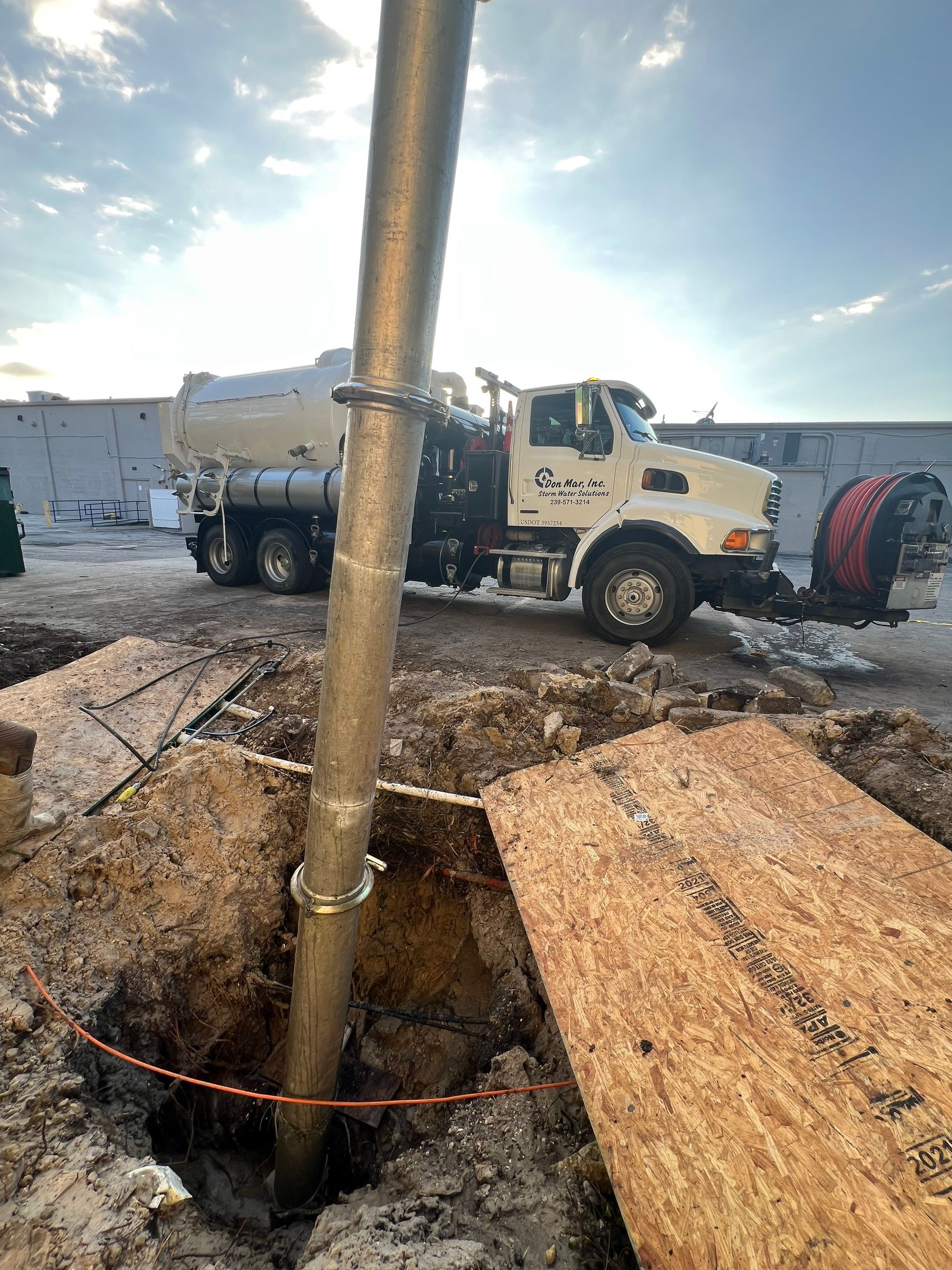 Hydro Excavating a Water Main for Repair by Don Mar, Inc. Storm Water Solutions