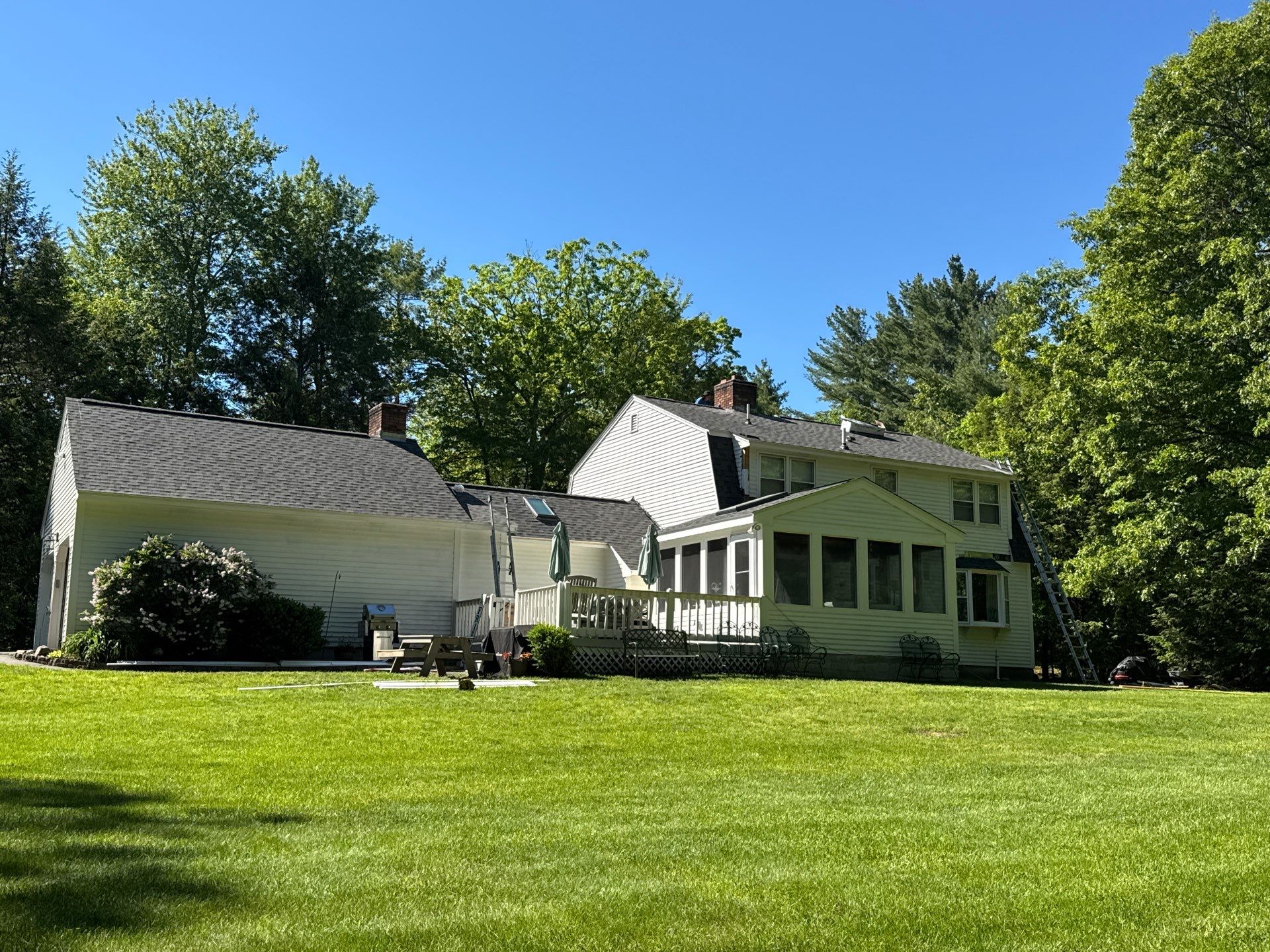 Bedford, NH Roof Replacement with Rot Repair, New Skylights & Owens Corning Duration Peppercorn Shingles by Compass exteriors