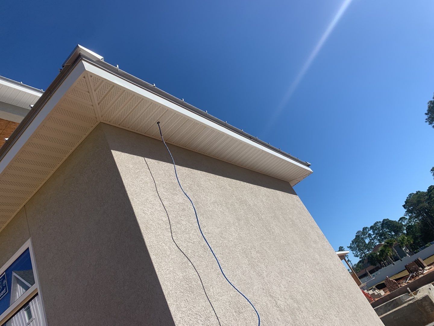 Soffit and Fascia Installation using White Vinyl Soffit in Pensacola FL by Gutter Professors