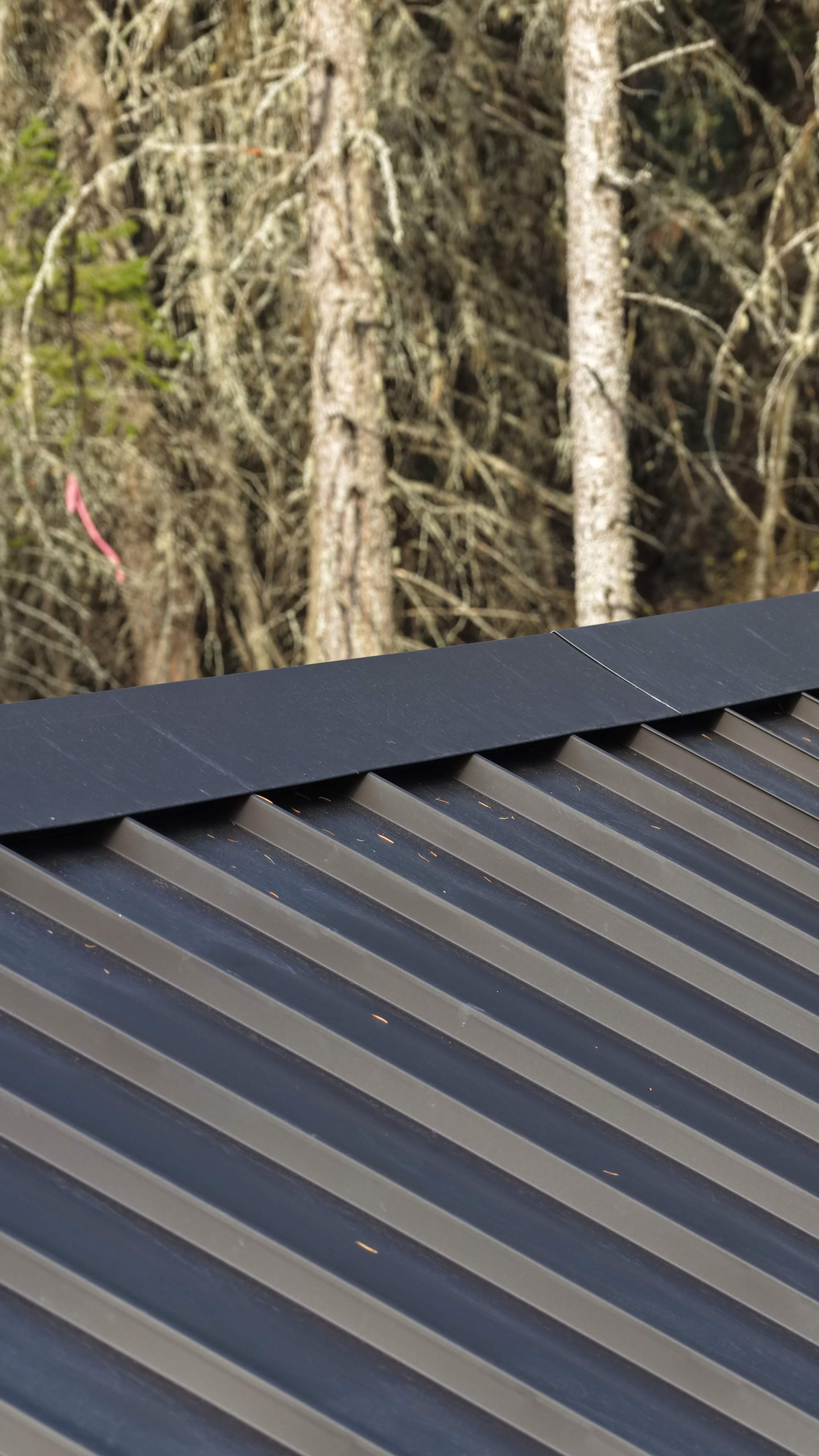Mechanical Lock Standing Seam - CMG ULG Dark Bronze  by Montana Roofing Solutions