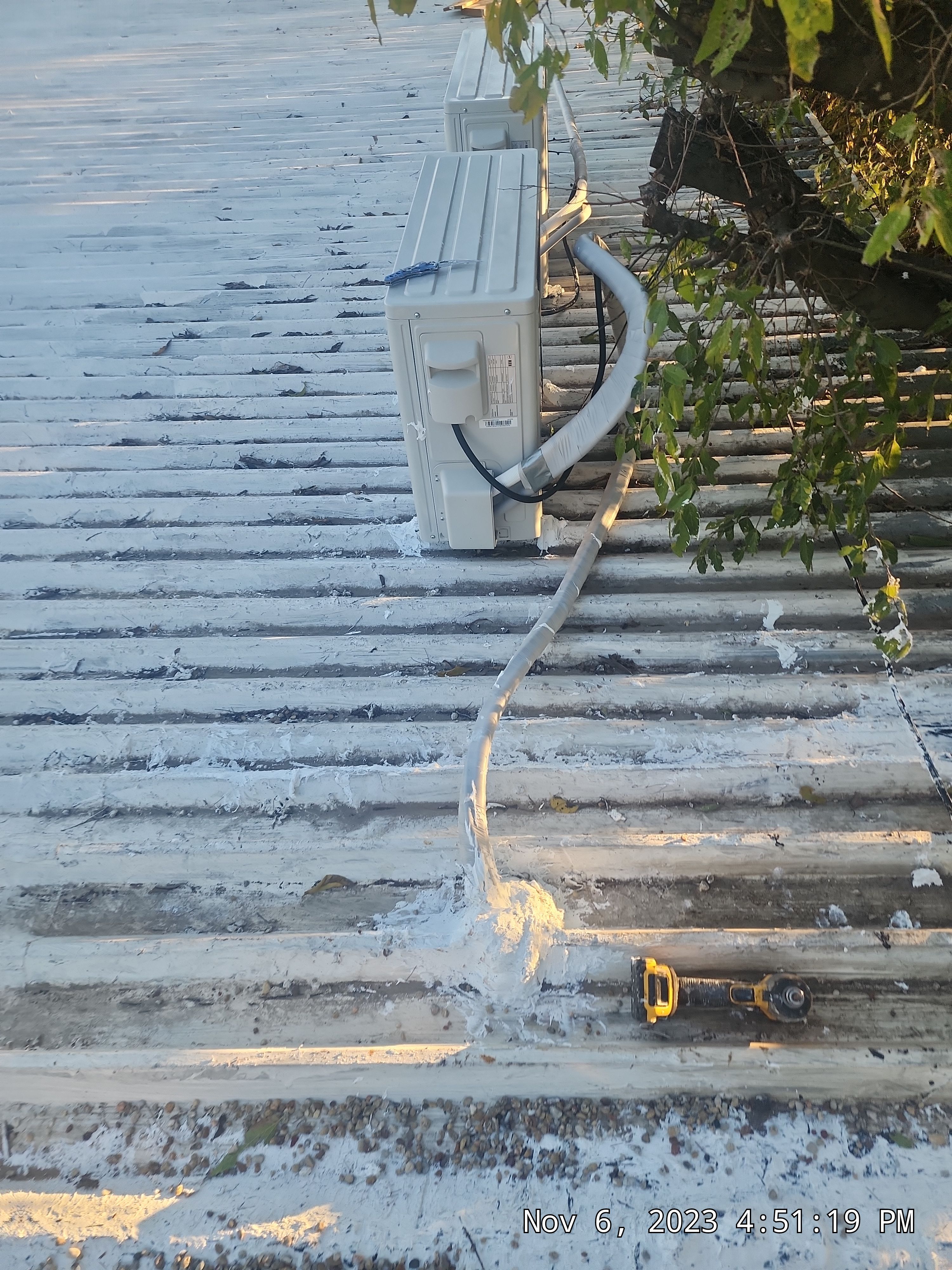 Commercial roofing overlay using GAF TPO over an old ballast roof by Becker Roofing and Exteriors