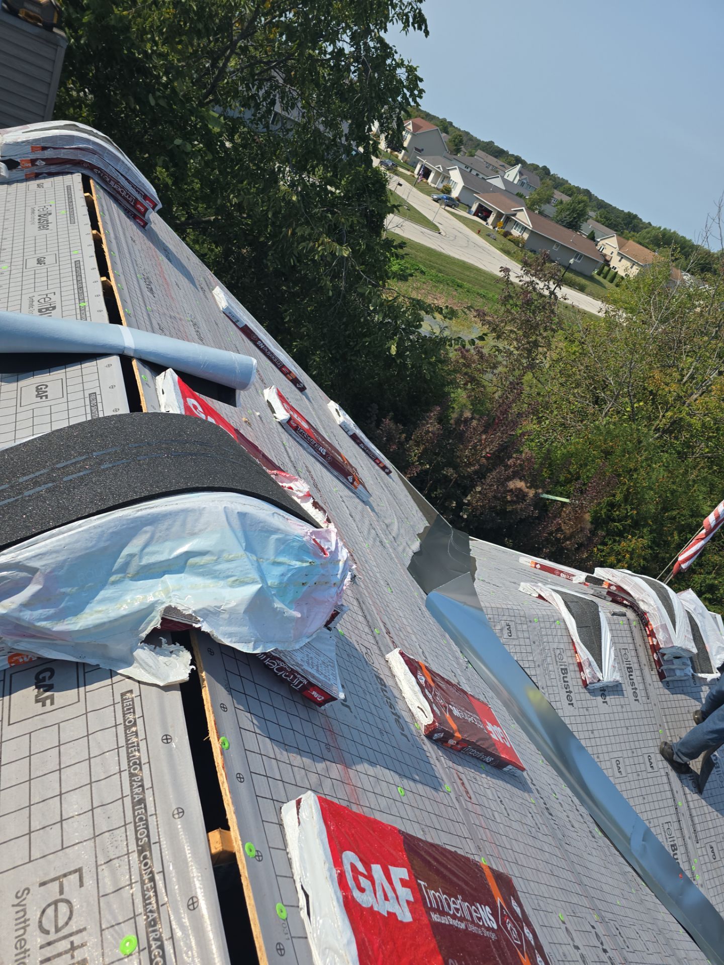 Residential Roof Installation in Sheboygan Falls, WI: GAF Timberline Natural Shadow Shingles & Rain Drop Gutter Protection by Gellings Roofing & Siding
