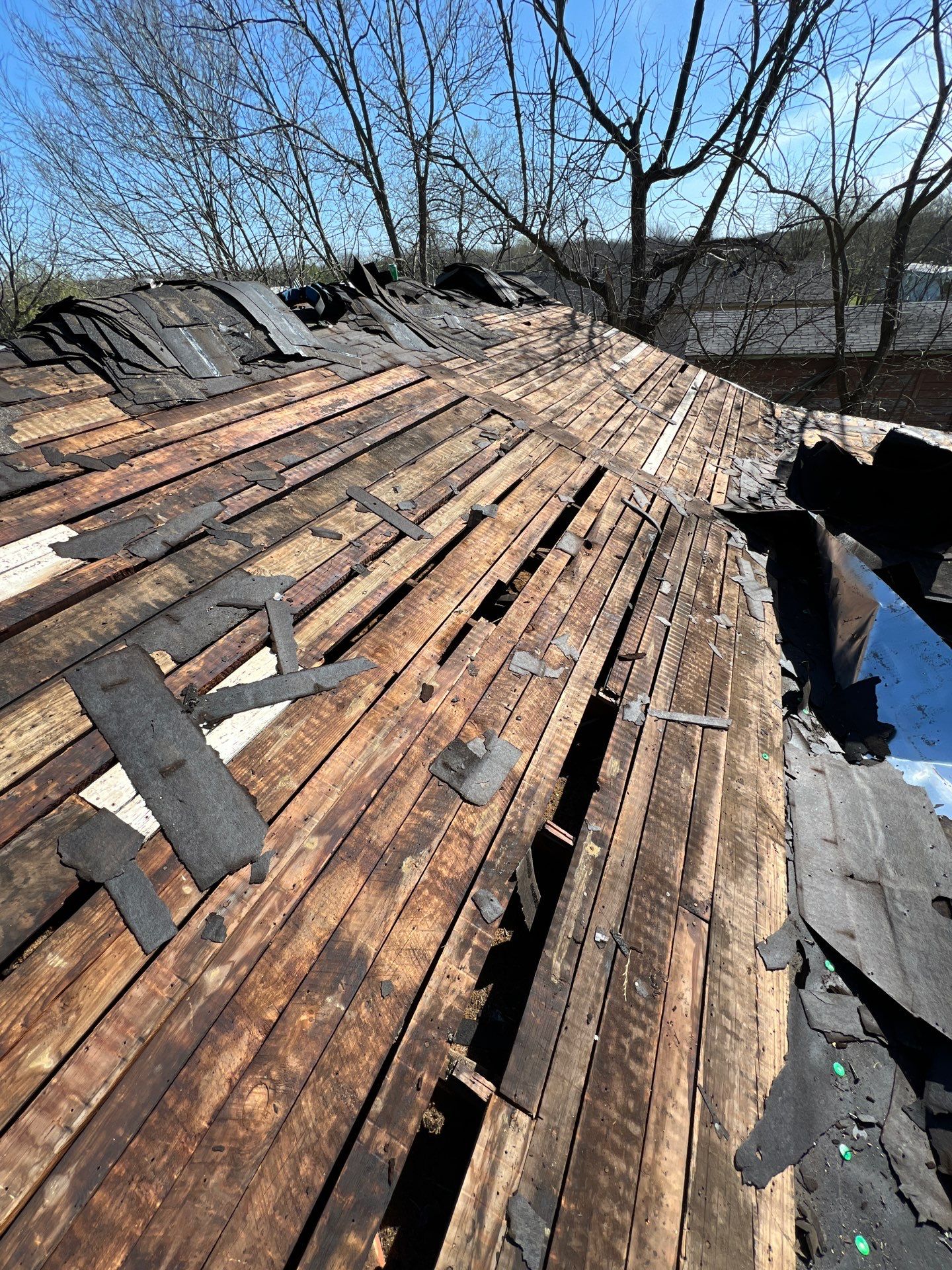 New Roof & Decking Brought to Code. by In & Out Construction & Remodeling, LLC