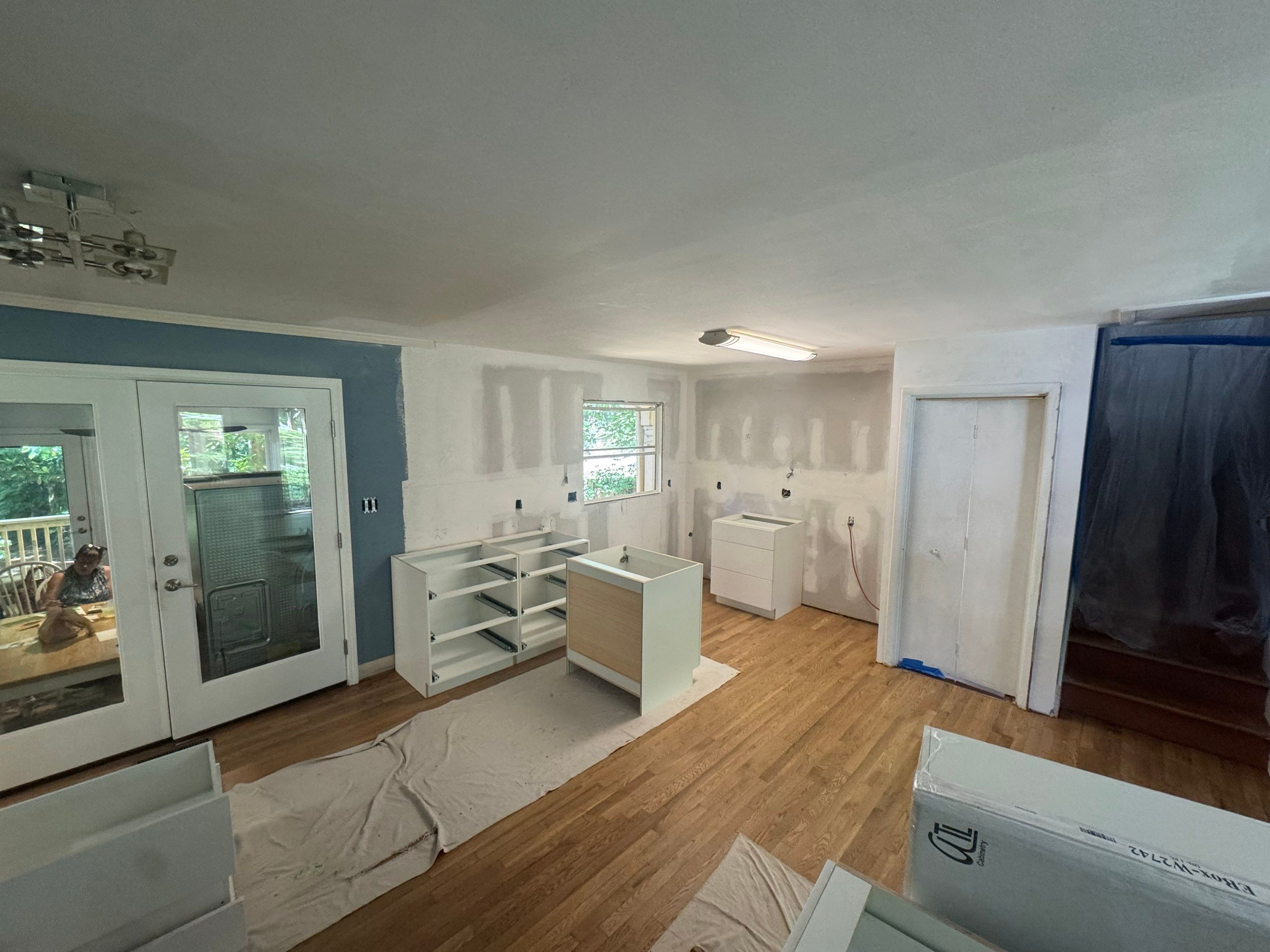 Modern Kitchen Remodeling with Large Central Island in Doraville by Swift Home Renovations
