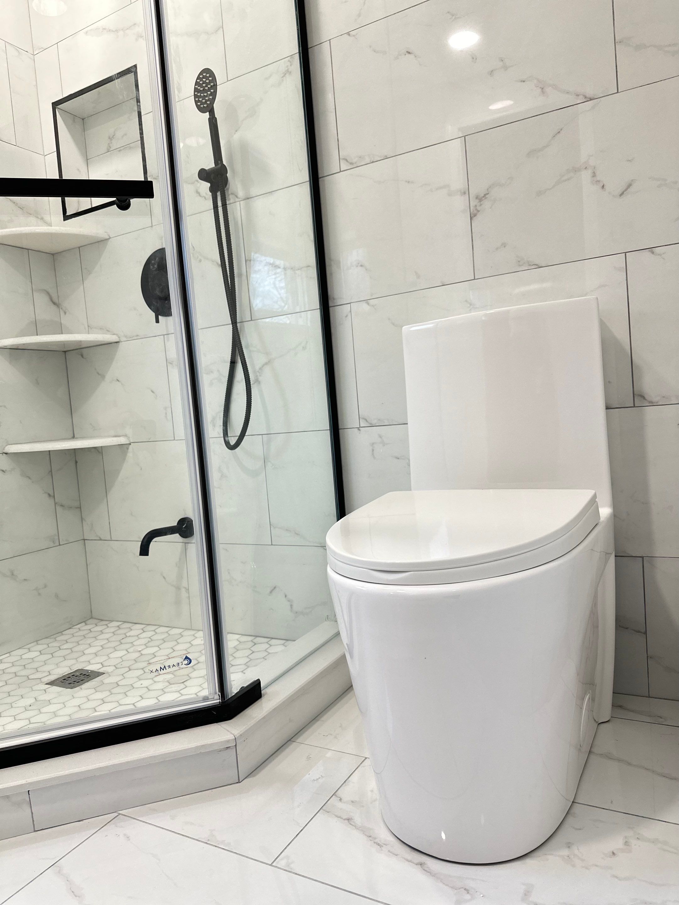 Bathroom Remodel using Tile by Home Concepts Construction