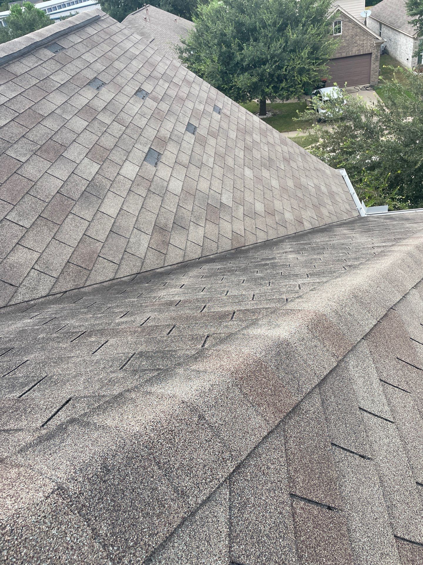 Hail Damage using Owen's Corning Duration (Lifetime) Shingles by Roof Repair Company
