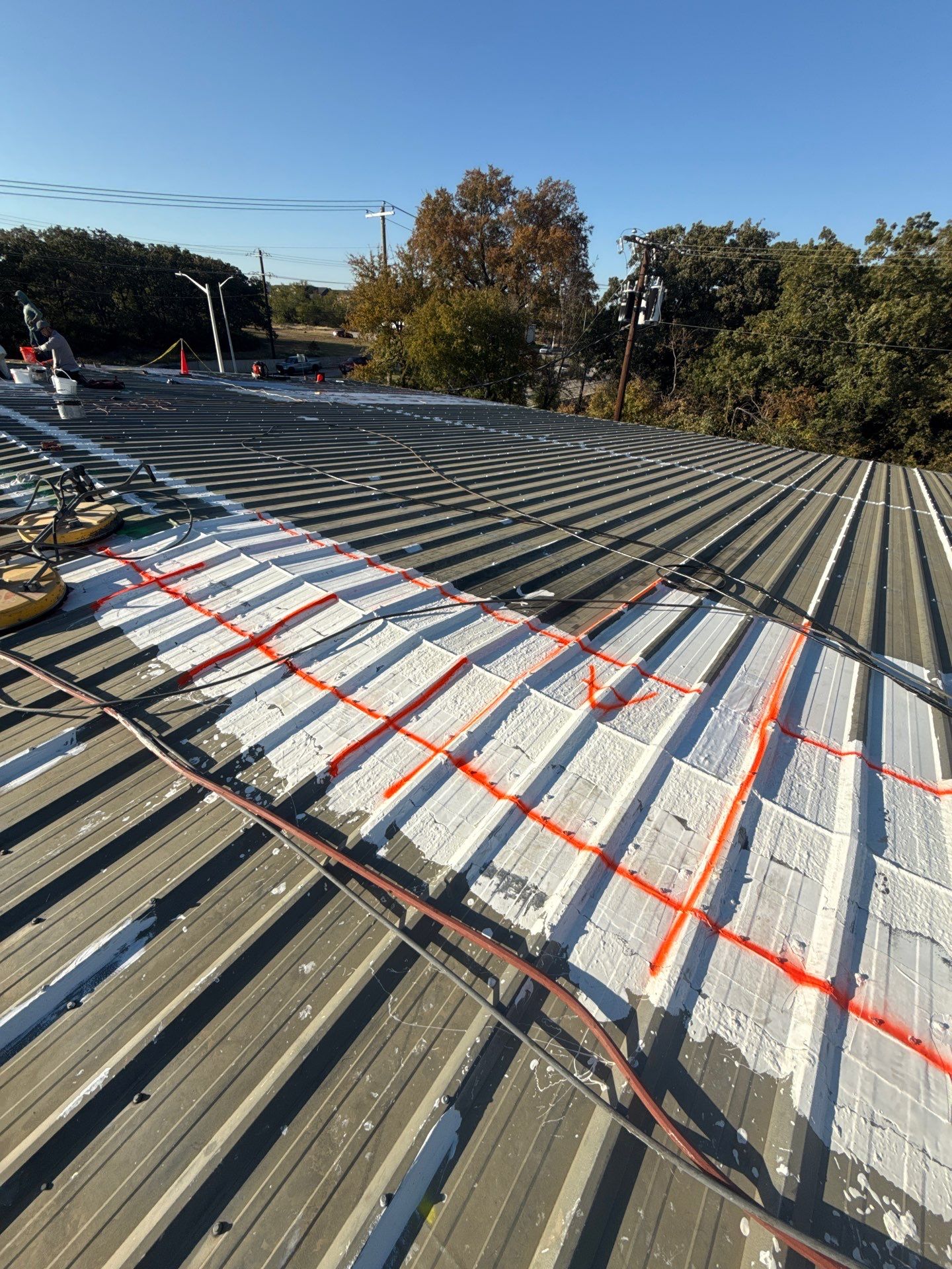 Silicone Coating Metal Rehab by First Out Roofing 