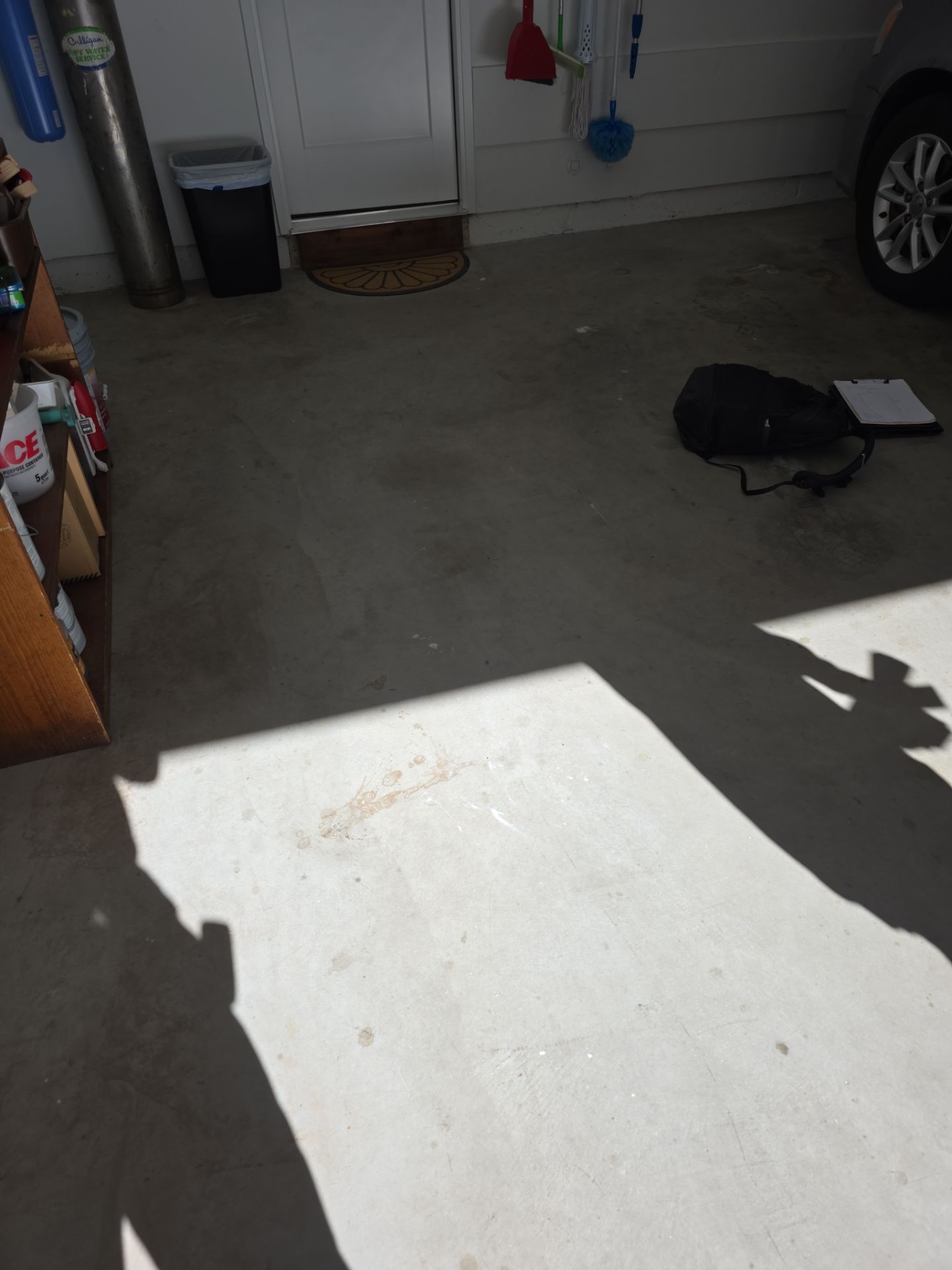 Morro Bay Garage Floor Transformation With Simiron Feather Gray Epoxy by MGP Coatings