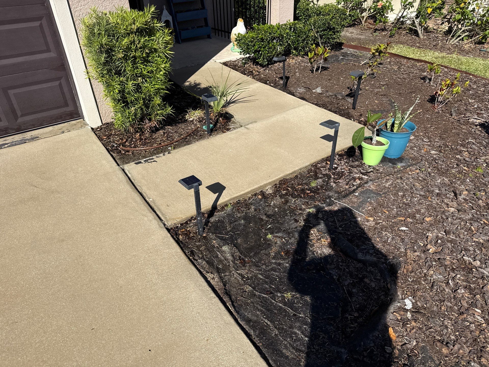 Painted Lanai Floor, Screen Enclosure, and Driveway Cleaning in Trevesta Community, Palmetto, FL by Sunshine AquaWash