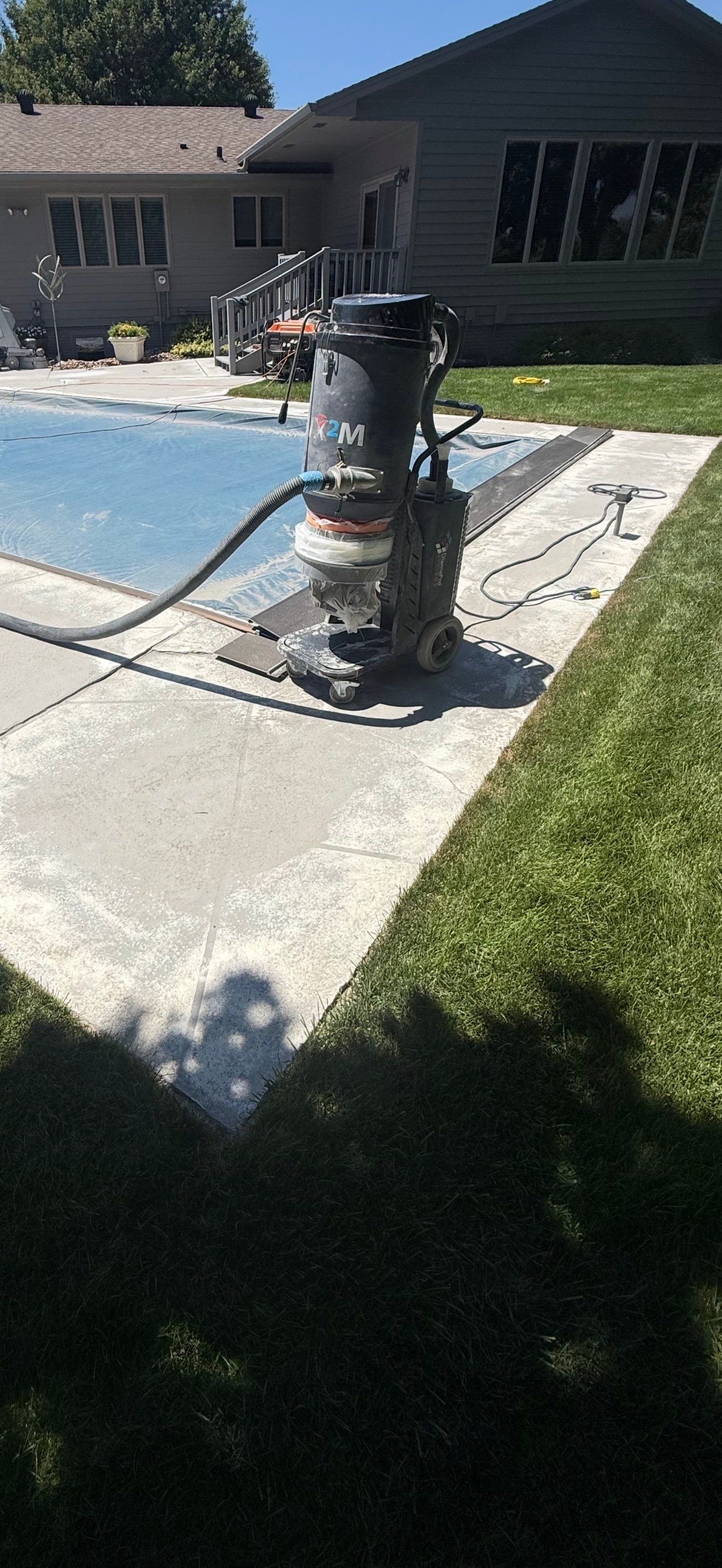 Residential Pool Deck Resurfacing in Sioux Falls by Select Painting, Coatings & Garage Cabinets