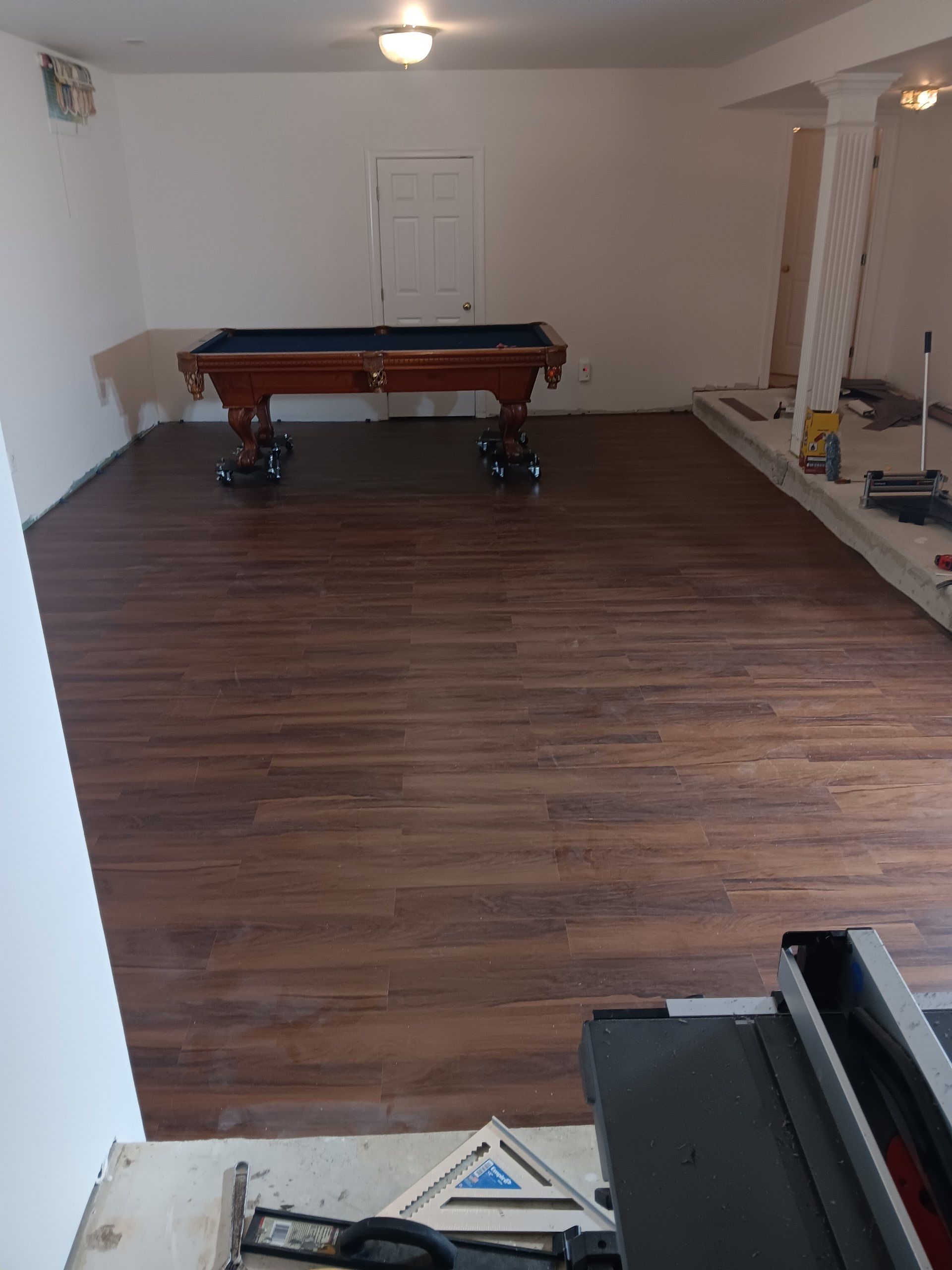 New Gutters, New Floor, New steps, New Paint job by Alpha Design Services