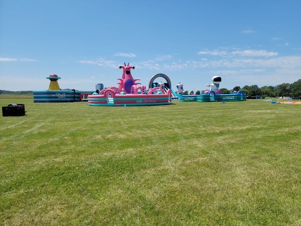 Cleaning for big bounce america prior to a large event by Northern Power Washing LLC.