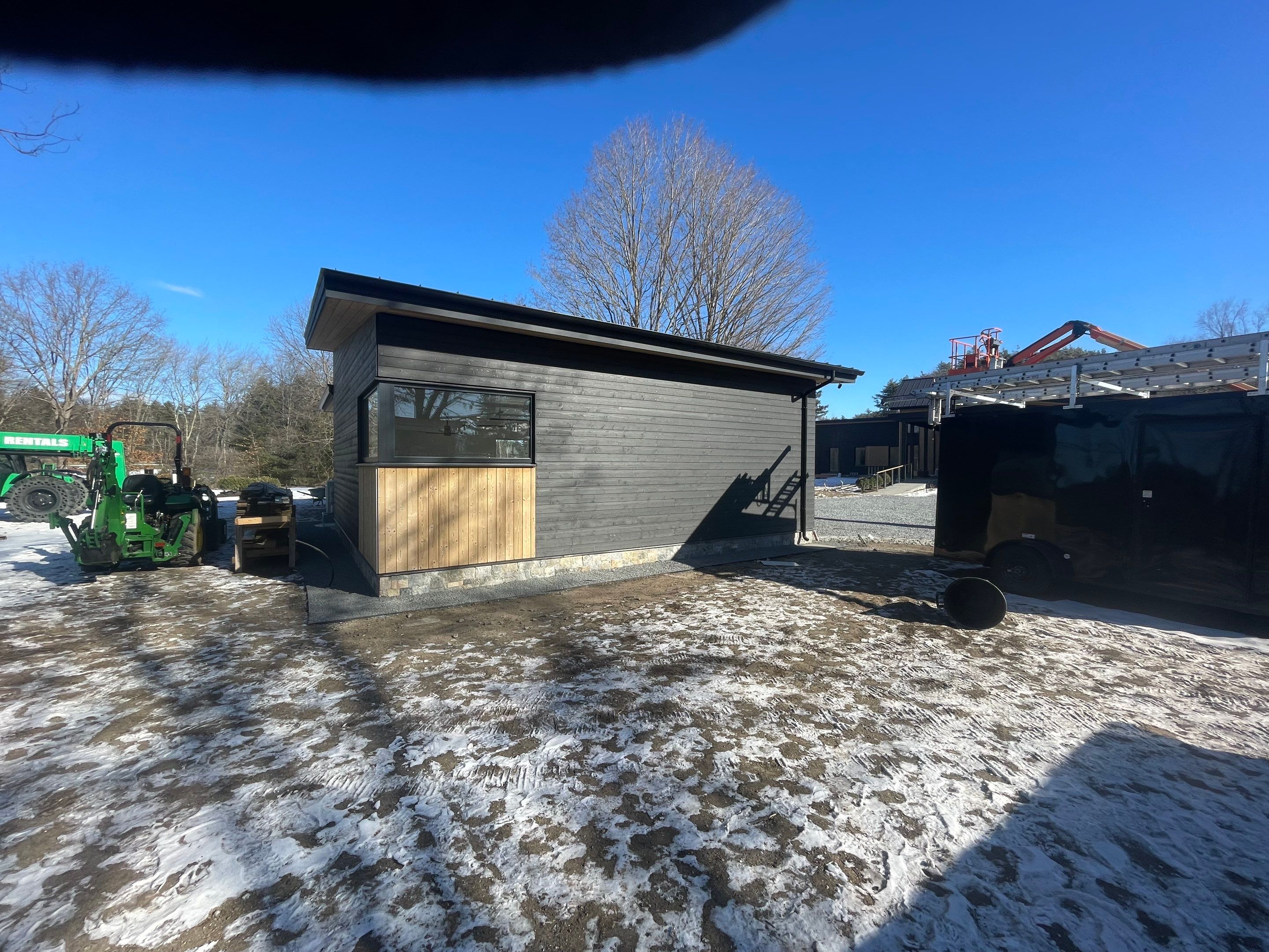 Gutter Installation using 6" Half Round Aluminum Gutter with 3" plain round aluminum downspouts and with a vinyl wedge buildout in Stow, MA. by Gutter Pro Enterprises