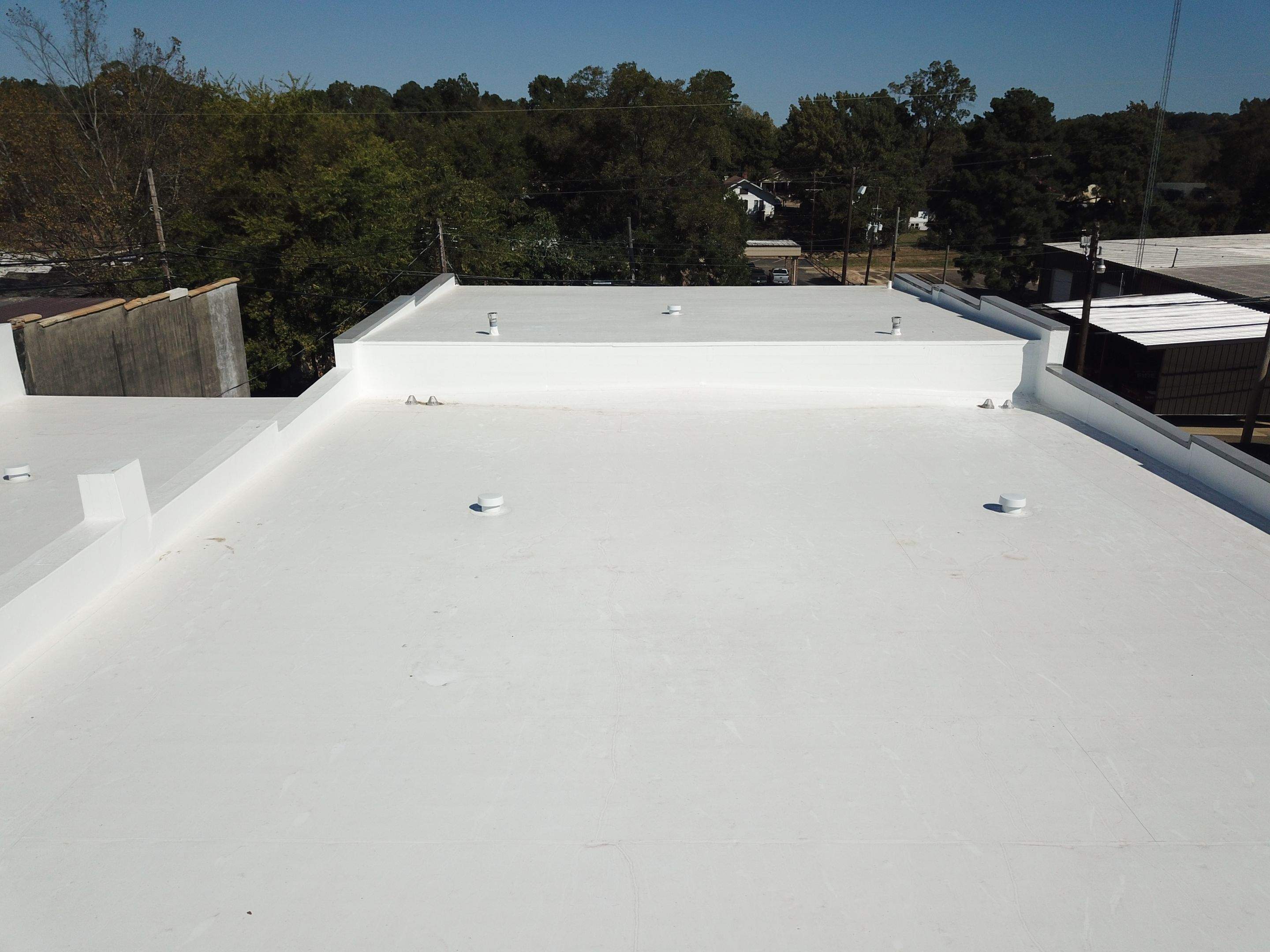 Commercial Roofing Installation in DeQueen, AR, using 50 mil PVC by Hostetler Roofing