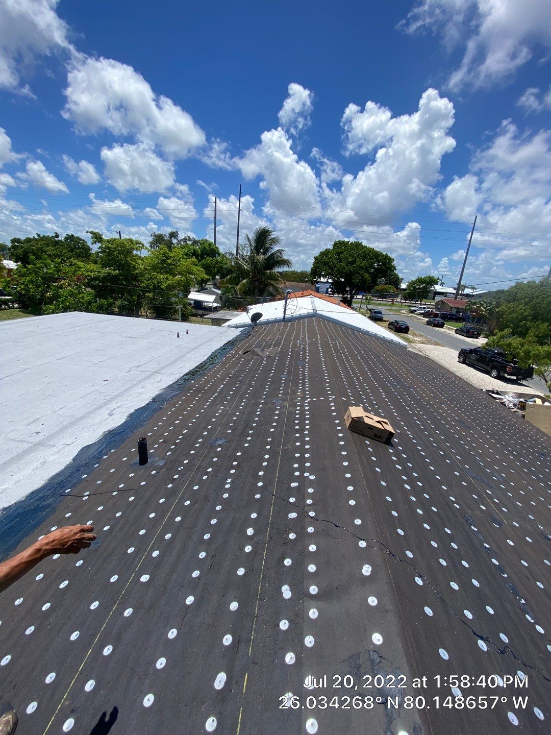 Standing Seam Metal & Flat Re-Roof using 1.5" Nail Strip 24ga Black Matte Kynar Coated Standing Seam Metal Panels by Morton Roofing, Inc.