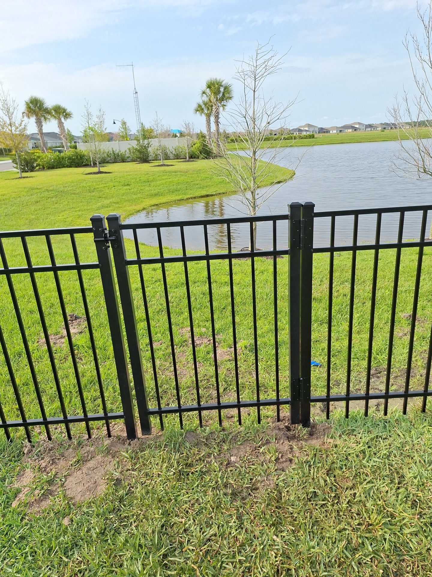 Aluminum Fence Installation using Black 3 Rail Aluminum Fence by Asap fence and gates, LLC
