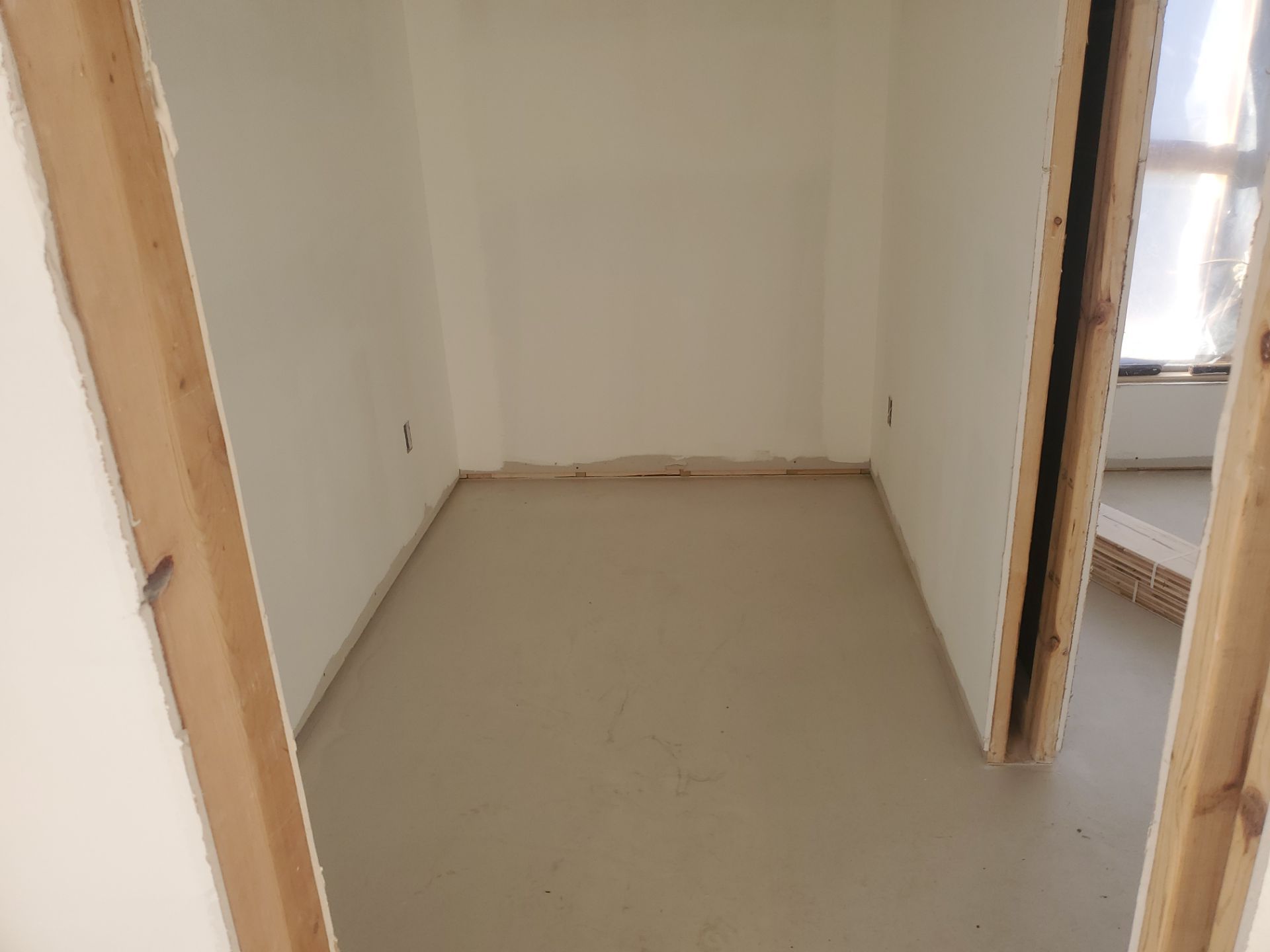 Full glue down Installation over radiant heat 7" Maple character grade by Ann Arbor Hardwoods 