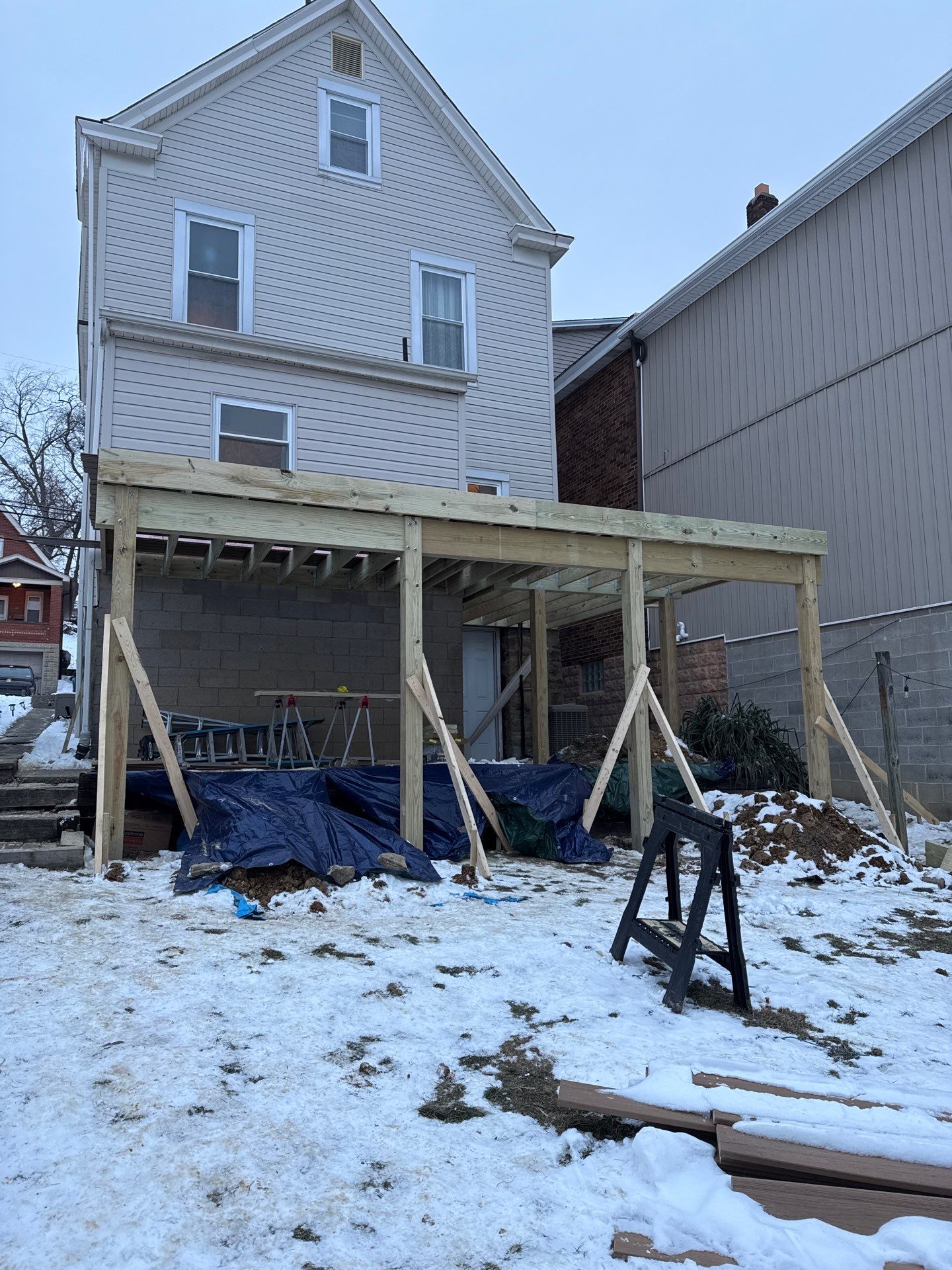 Deck and door by Cousins Roofing Siding & Decks