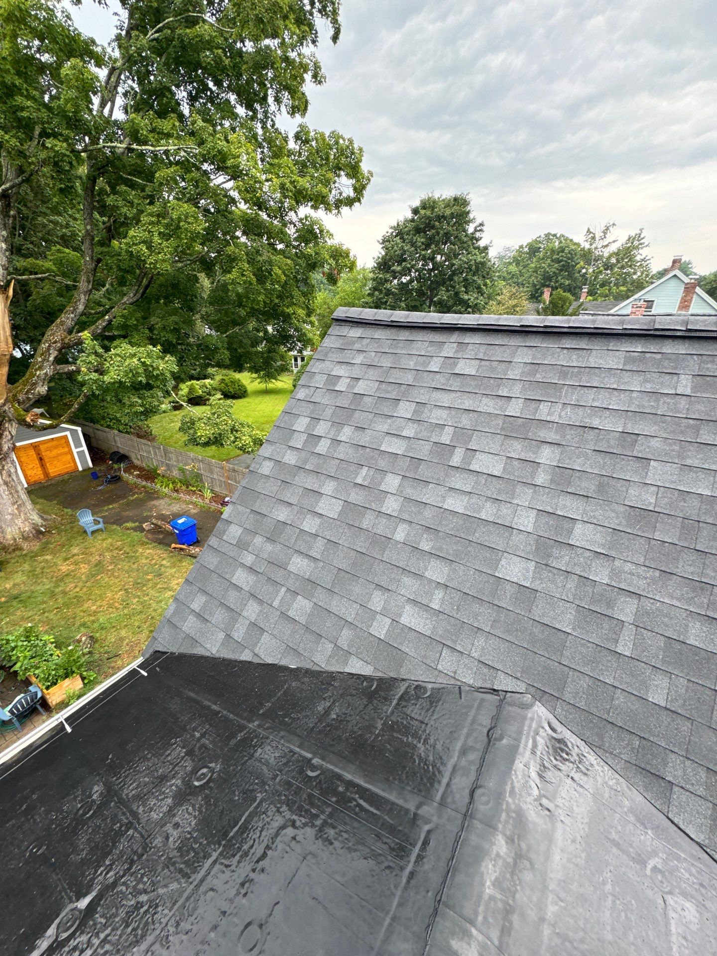 Full Roof Replacement + Custom Gutter Install | Onyx Black Finish by Mighty Dog Roofing of Greater Middlesex County