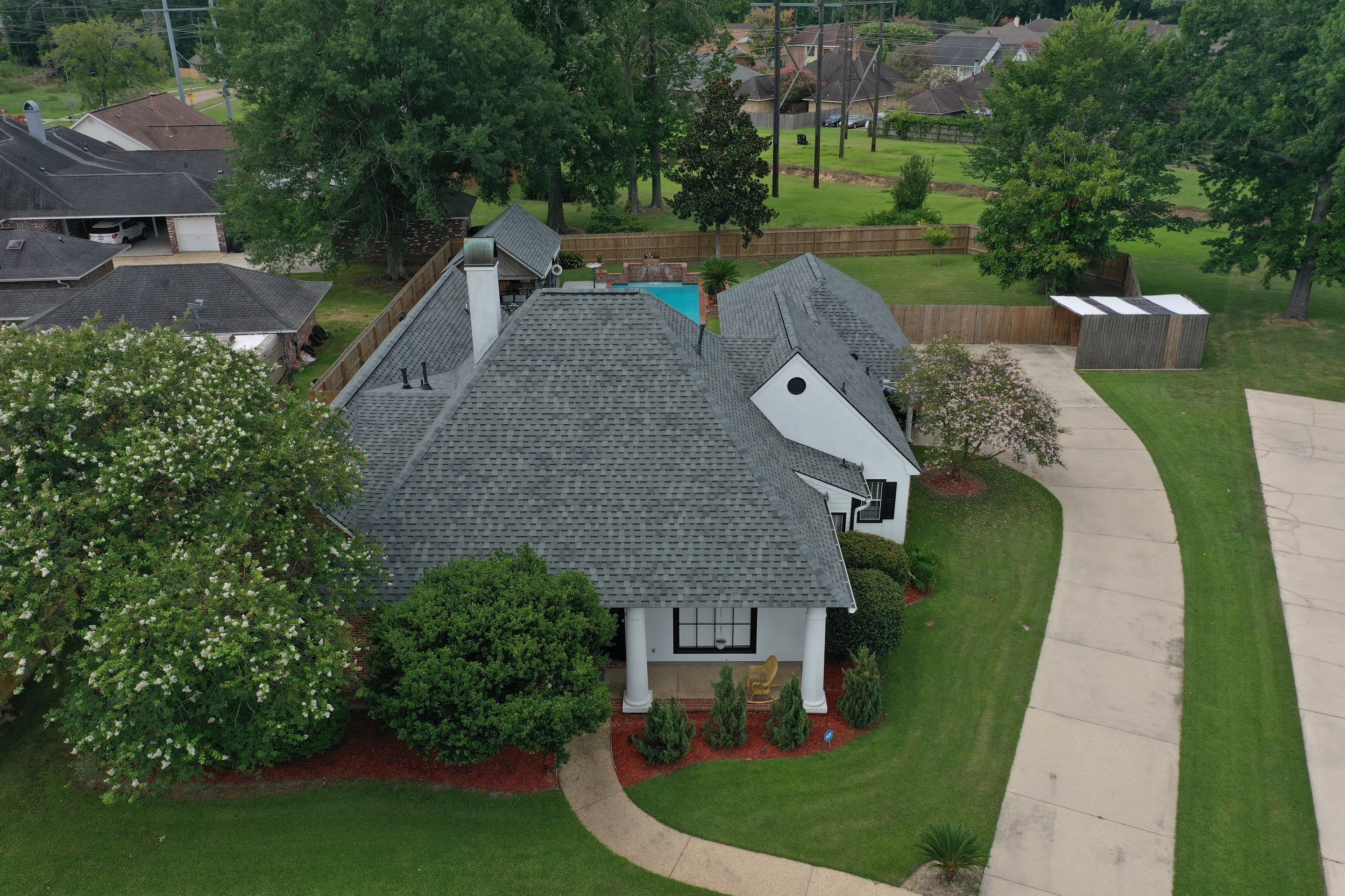 Residential Roofing Installation using Atlas Pinnacle Pristine Hearthstone by Top Team Construction